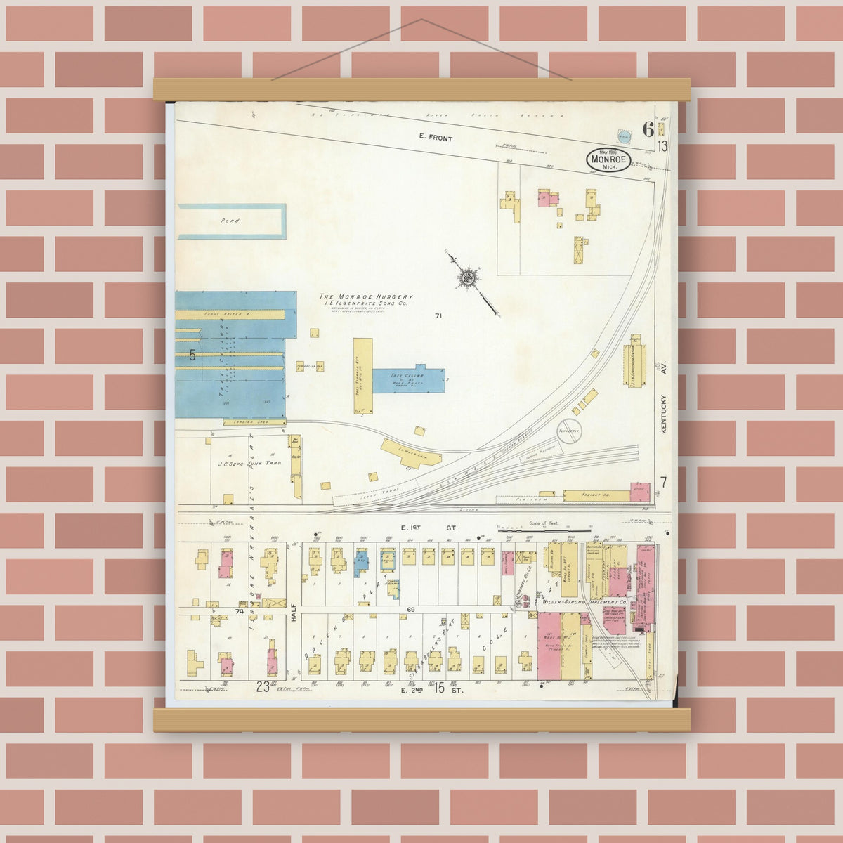 Old map wall art mockup — magnetic wood frame on brick wall — Sanborn Fire Insurance Map from Monroe, Monroe County, Michigan (1916), Sheet #0006