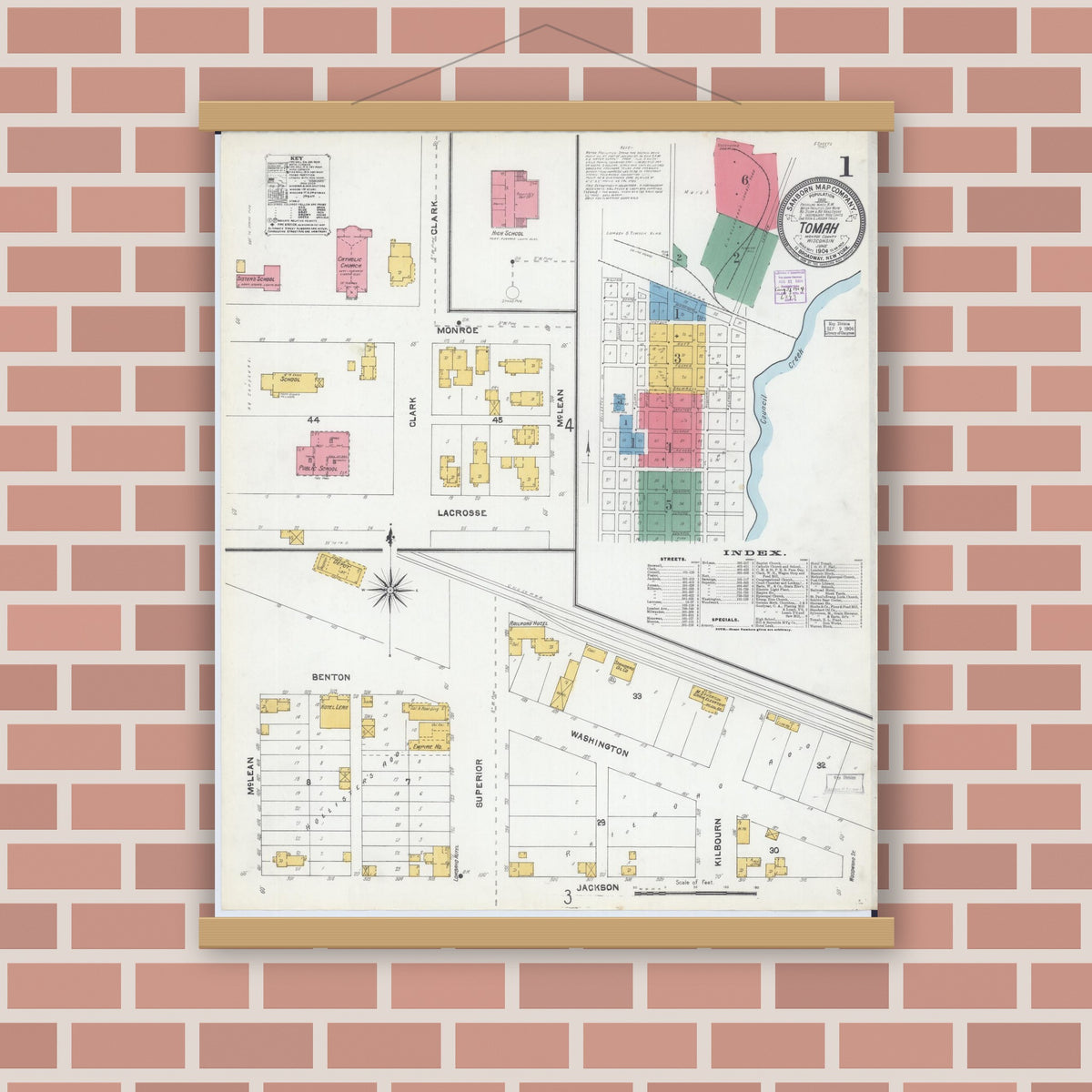 Old map wall art mockup — magnetic wood frame on brick wall — Sanborn Fire Insurance Map from Tomah, Monroe County, Wisconsin (1904), Sheet #0001
