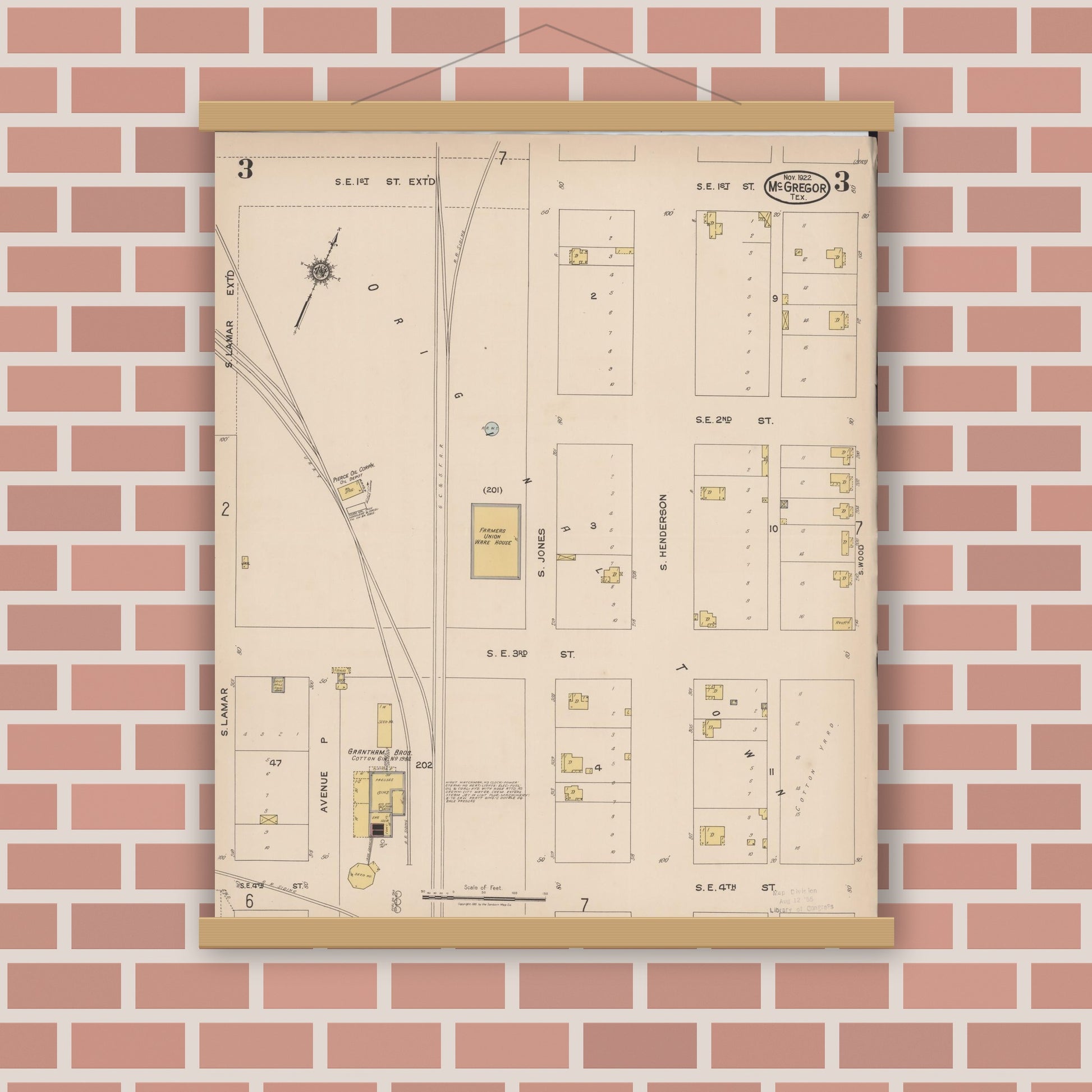 Old map wall art mockup — magnetic wood frame on brick wall — Sanborn Fire Insurance Map from McGregor, McLennan County, Texas (1922), Sheet #0003