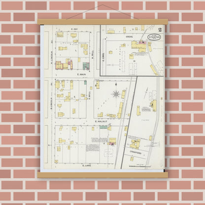 Old map wall art mockup — magnetic wood frame on brick wall — Sanborn Fire Insurance Map from Stanton, Montcalm County, Michigan (1892), Sheet #0002