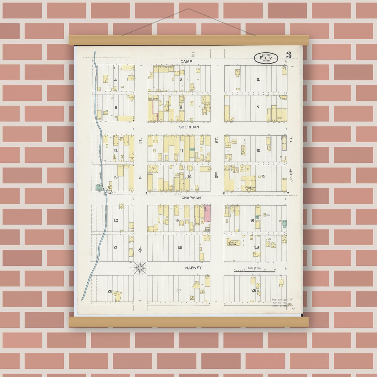 Old map wall art mockup — magnetic wood frame on brick wall — Sanborn Fire Insurance Map from Ely, Saint Louis County, Minnesota (1892), Sheet #0003