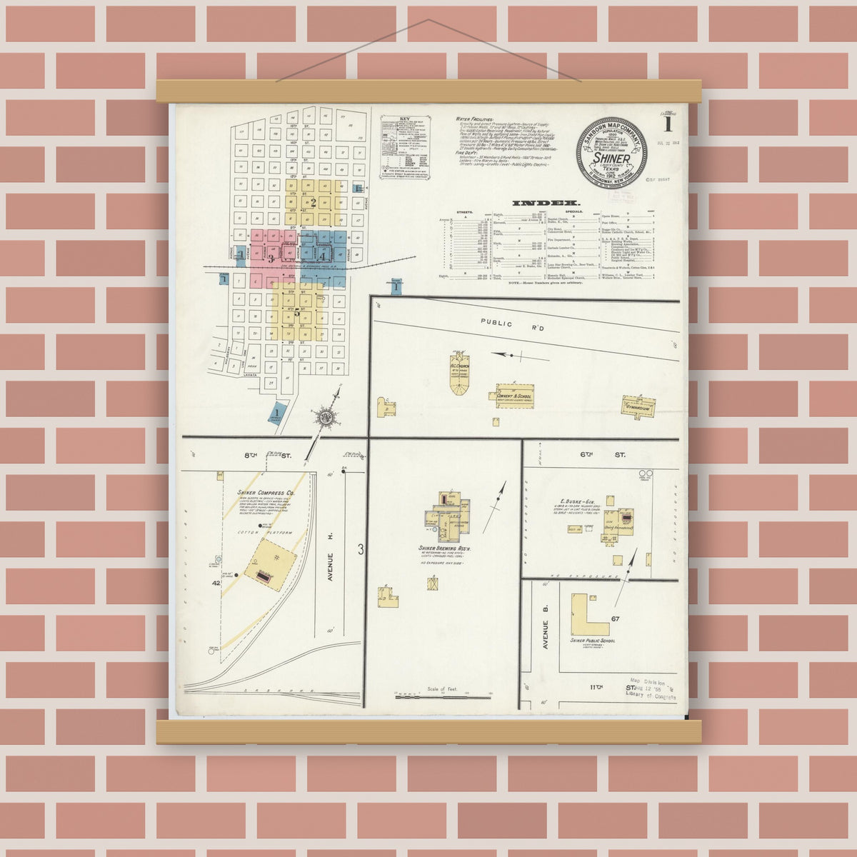 Old map wall art mockup — magnetic wood frame on brick wall — Sanborn Fire Insurance Map from Shiner, Lavaca County, Texas (1912), Sheet #0001