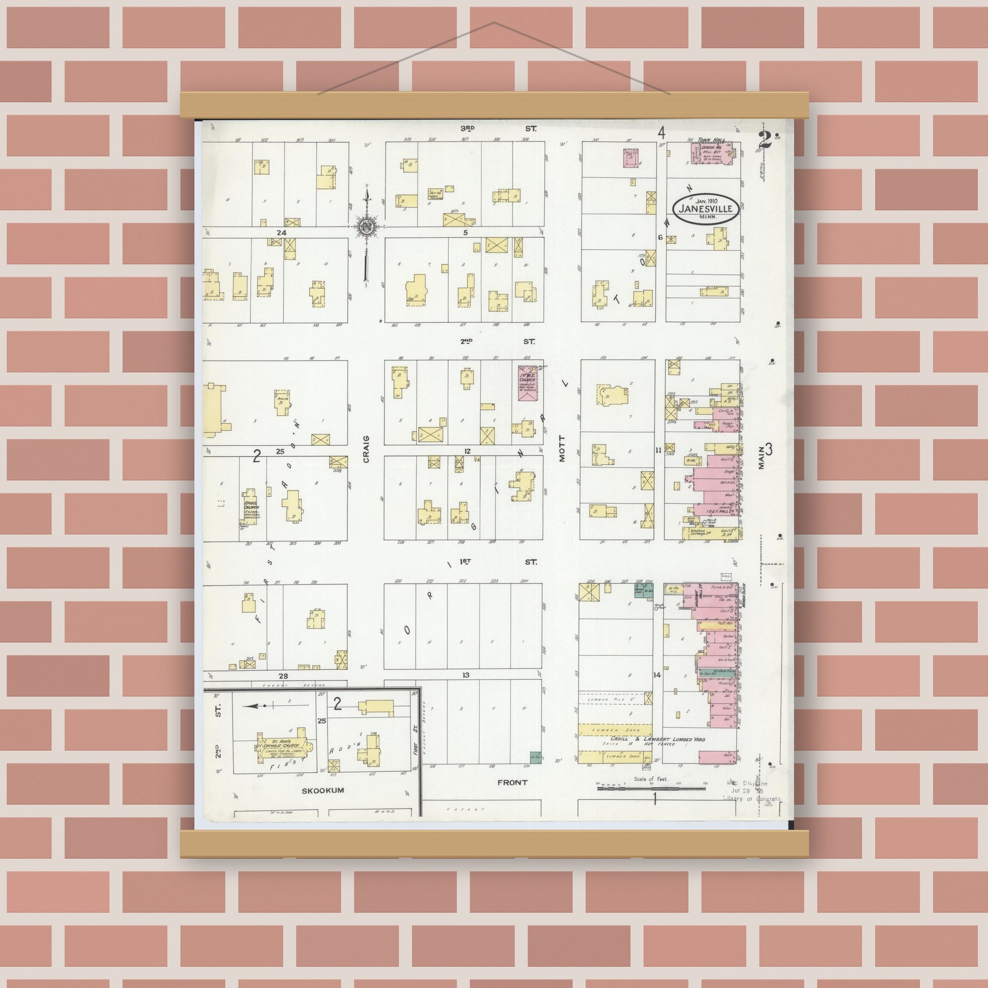Old map wall art mockup — magnetic wood frame on brick wall — Sanborn Fire Insurance Map from Janesville, Waseca County, Minnesota (1910), Sheet #0002