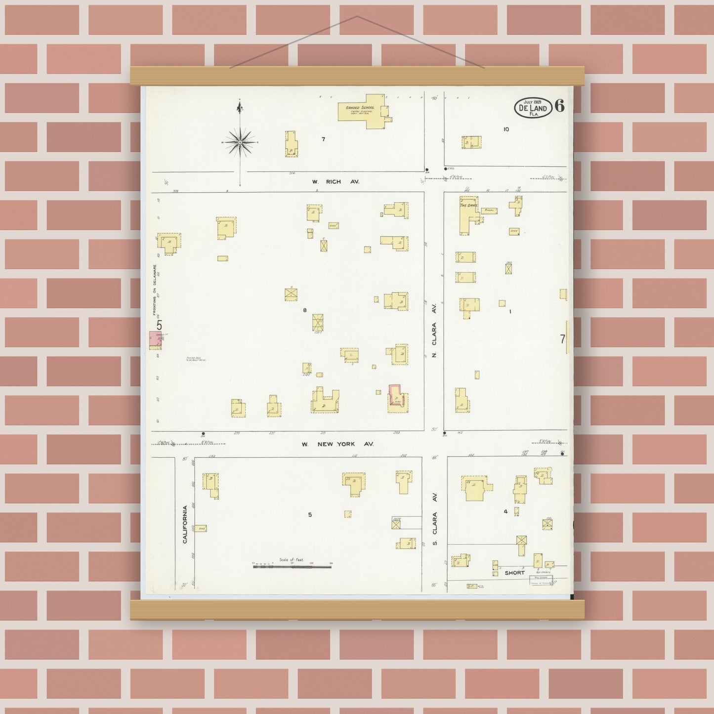 Old map wall art mockup — magnetic wood frame on brick wall — Sanborn Fire Insurance Map from De Land, Volusia County, Florida (1909), Sheet #0006