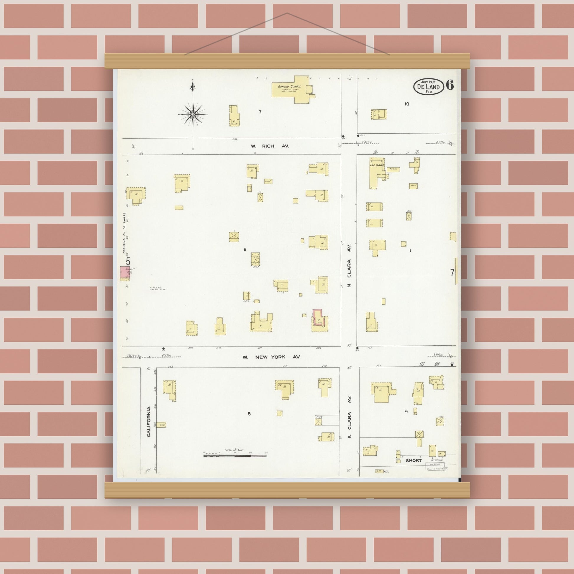 Old map wall art mockup — magnetic wood frame on brick wall — Sanborn Fire Insurance Map from De Land, Volusia County, Florida (1909), Sheet #0006
