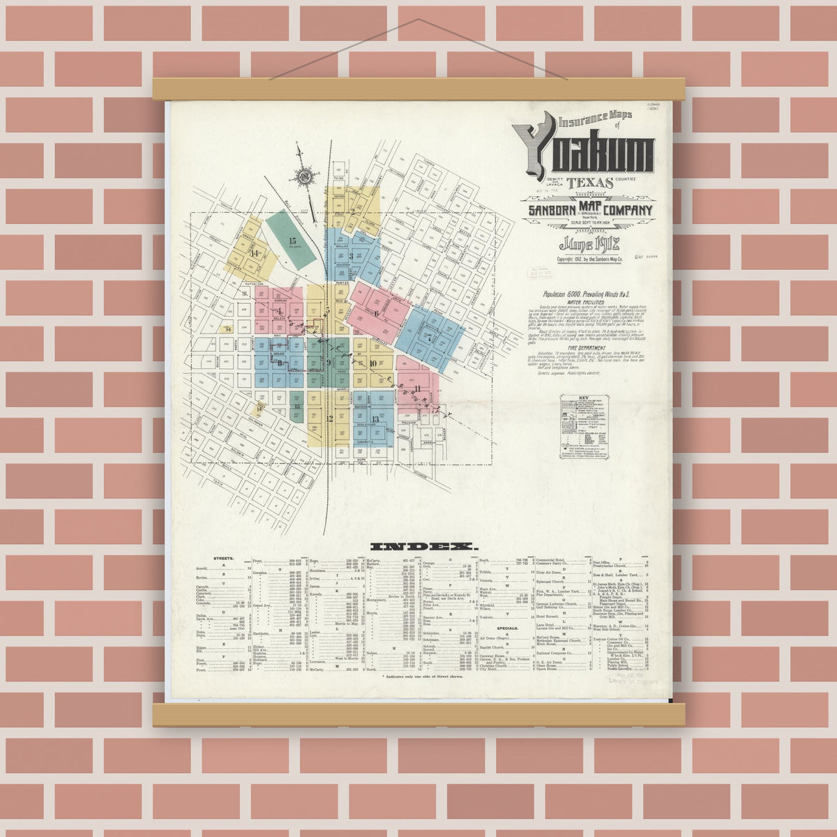 Old map wall art mockup — magnetic wood frame on brick wall — Sanborn Fire Insurance Map from Yoakum, De Witt And Lavaca Counties, Texas (1912) - Complete Map Set