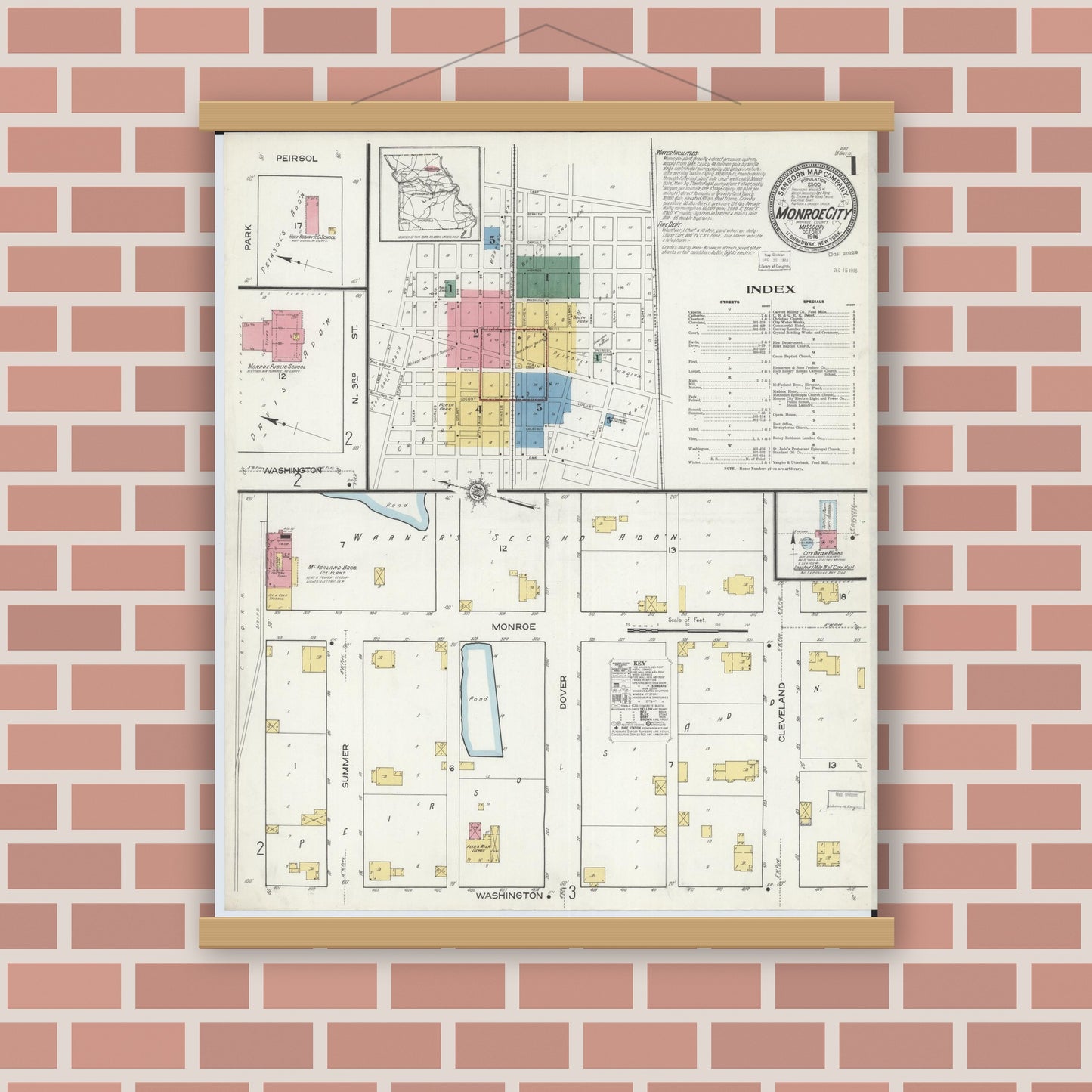 Old map wall art mockup — magnetic wood frame on brick wall — Sanborn Fire Insurance Map from Monroe City, Monroe County, Missouri (1916) - Complete Map Set