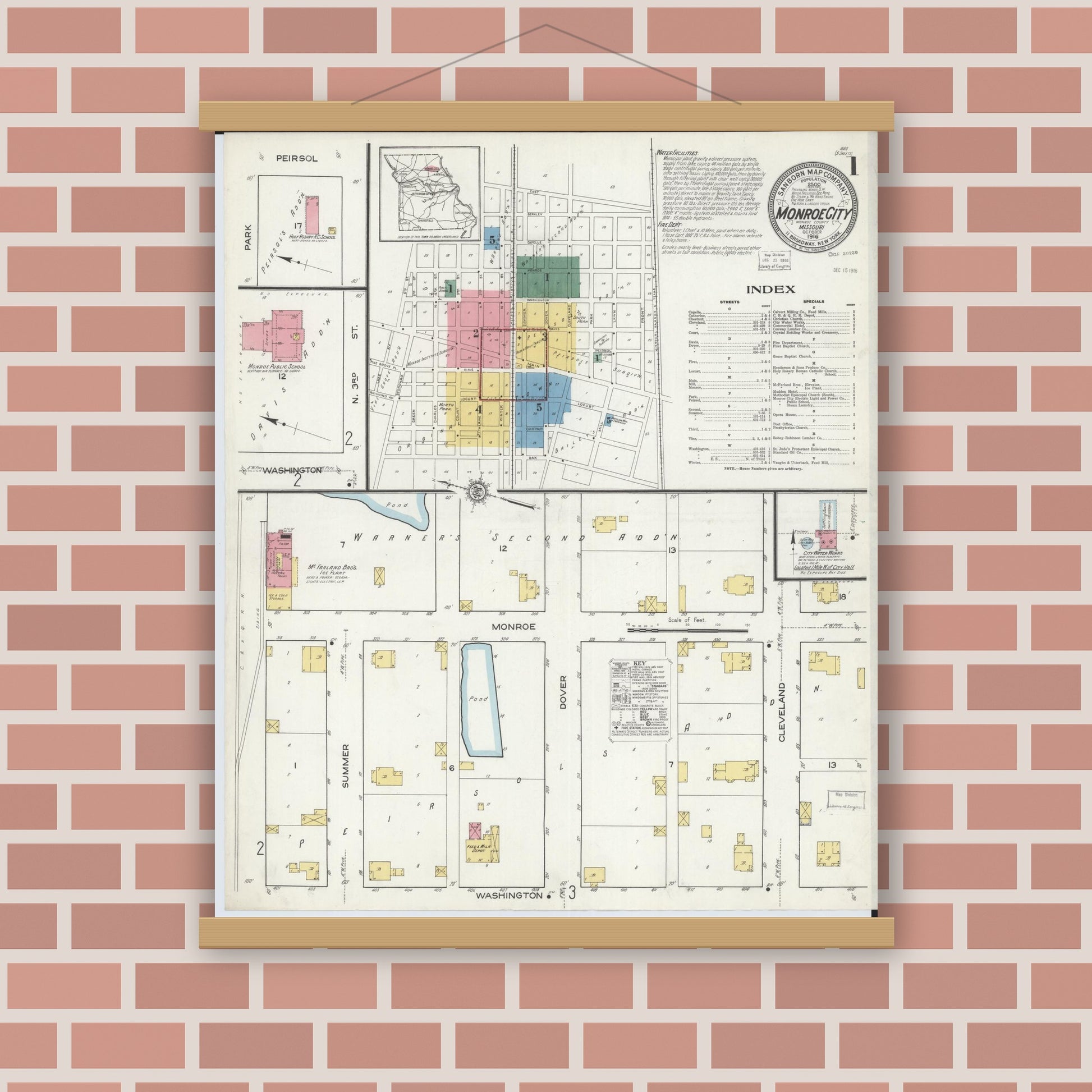 Old map wall art mockup — magnetic wood frame on brick wall — Sanborn Fire Insurance Map from Monroe City, Monroe County, Missouri (1916) - Complete Map Set