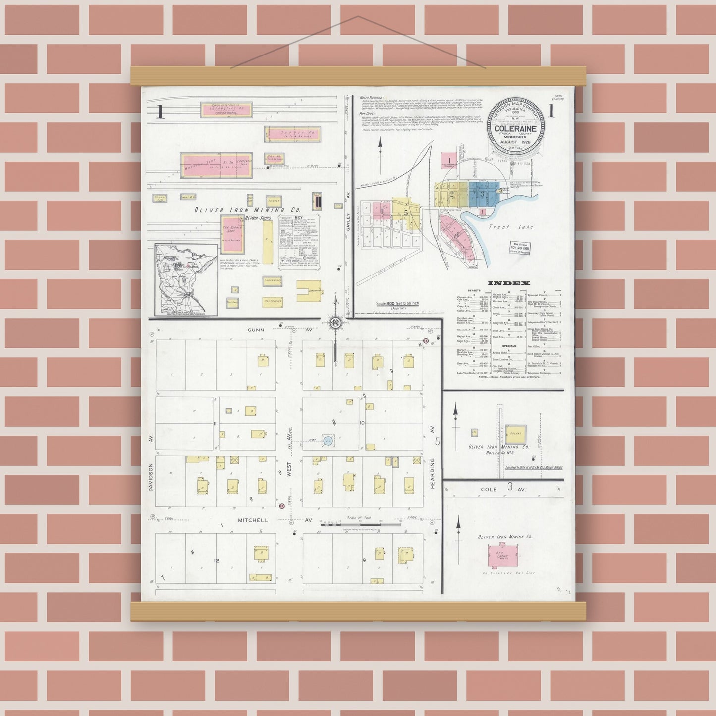 Old map wall art mockup — magnetic wood frame on brick wall — Sanborn Fire Insurance Map from Coleraine, Itasca County, Minnesota (1928), Sheet #0001