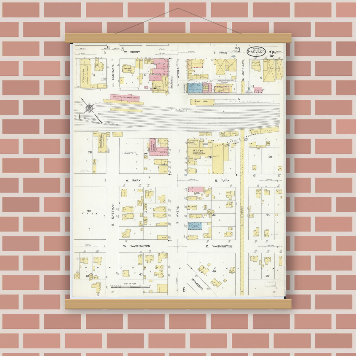 Old map wall art mockup — magnetic wood frame on brick wall — Sanborn Fire Insurance Map from Harvard, McHenry County, Illinois (1912), Sheet #0002