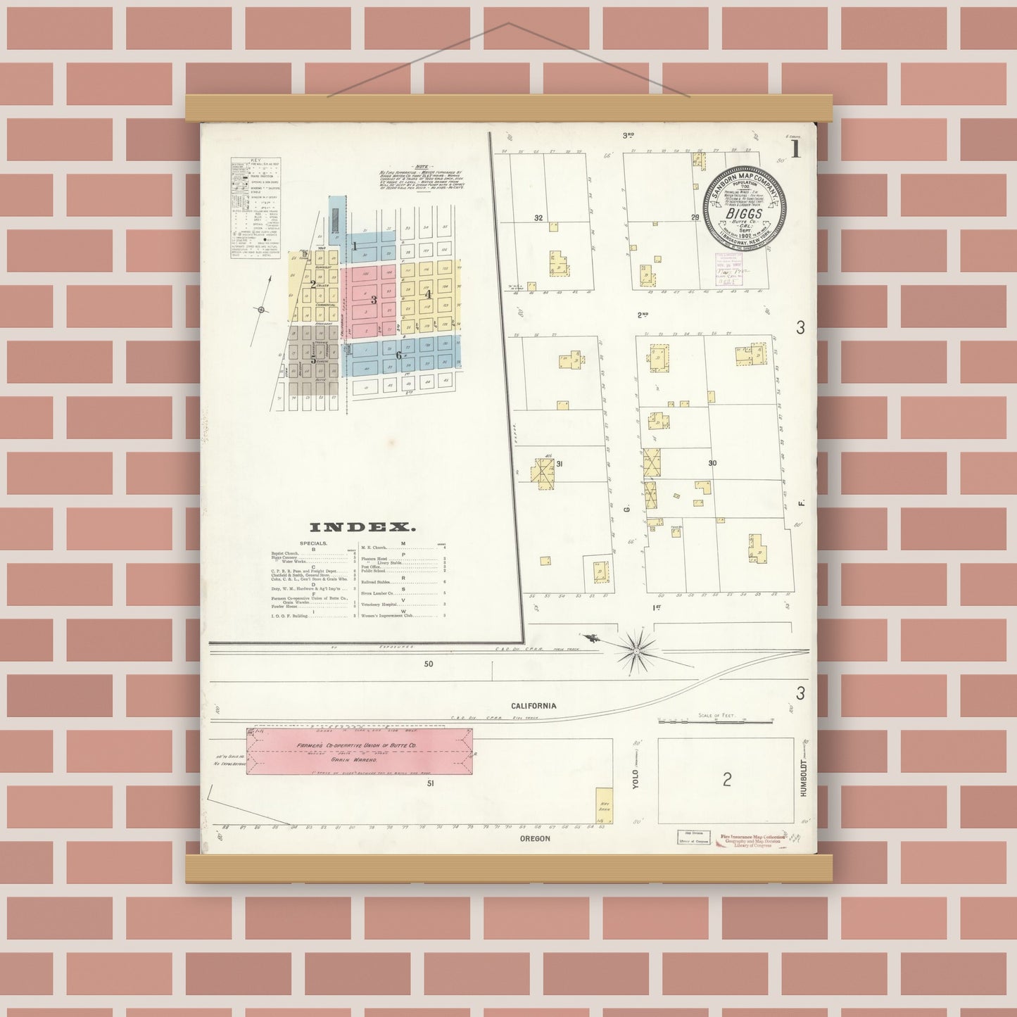 Old map wall art mockup — magnetic wood frame on brick wall — Sanborn Fire Insurance Map from Biggs, Butte County, California (1902), Sheet #0001