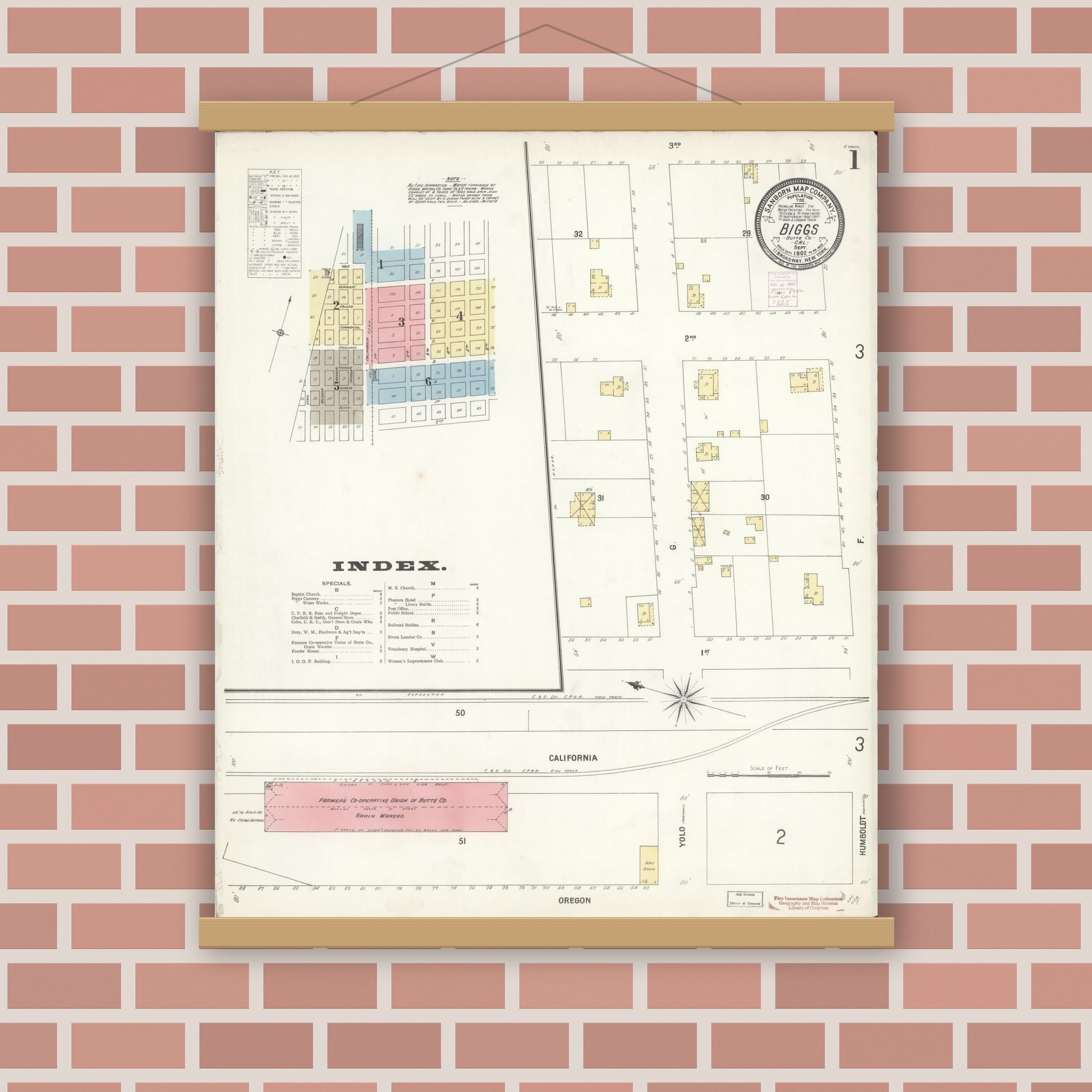 Old map wall art mockup — magnetic wood frame on brick wall — Sanborn Fire Insurance Map from Biggs, Butte County, California (1902), Sheet #0001