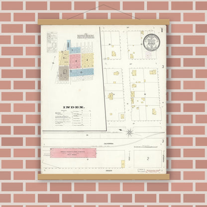 Old map wall art mockup — magnetic wood frame on brick wall — Sanborn Fire Insurance Map from Biggs, Butte County, California (1902), Sheet #0001