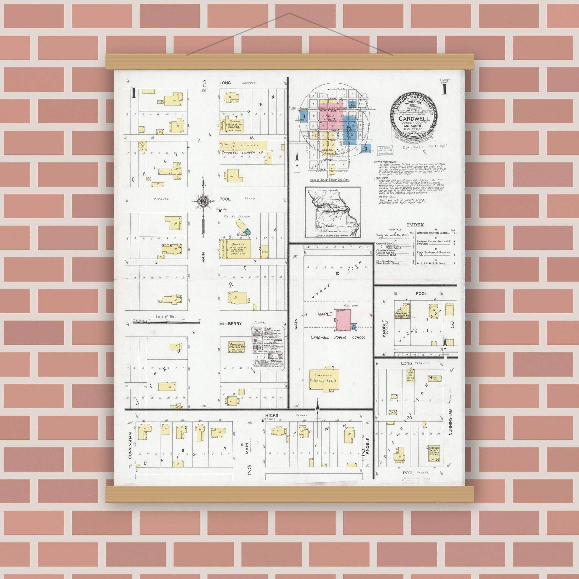 Old map wall art mockup — magnetic wood frame on brick wall — Sanborn Fire Insurance Map from Cardwell, Dunklin County, Missouri (1928) - Complete Map Set