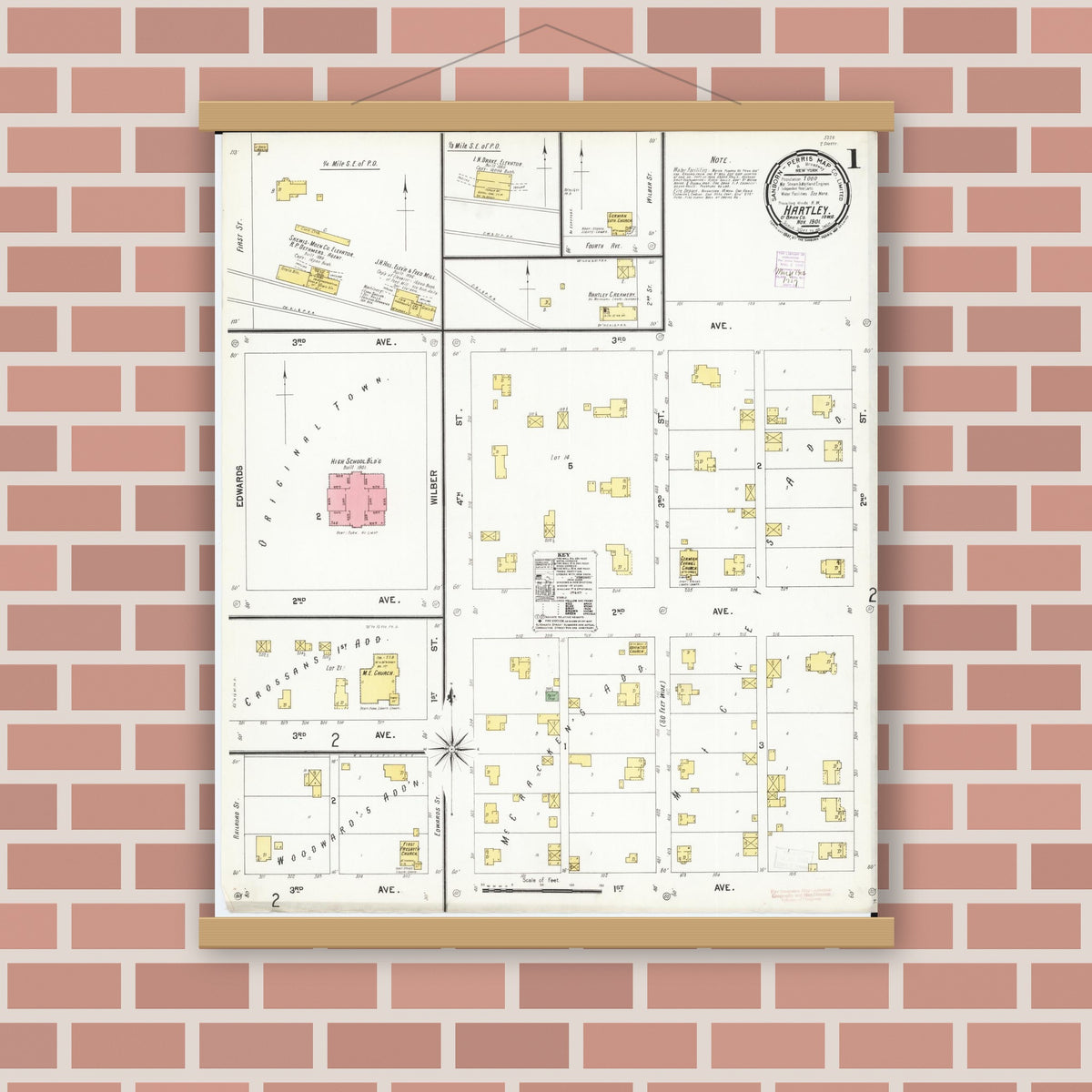 Old map wall art mockup — magnetic wood frame on brick wall — Sanborn Fire Insurance Map from Hartley, O'Brien County, Iowa (1901), Sheet #0001