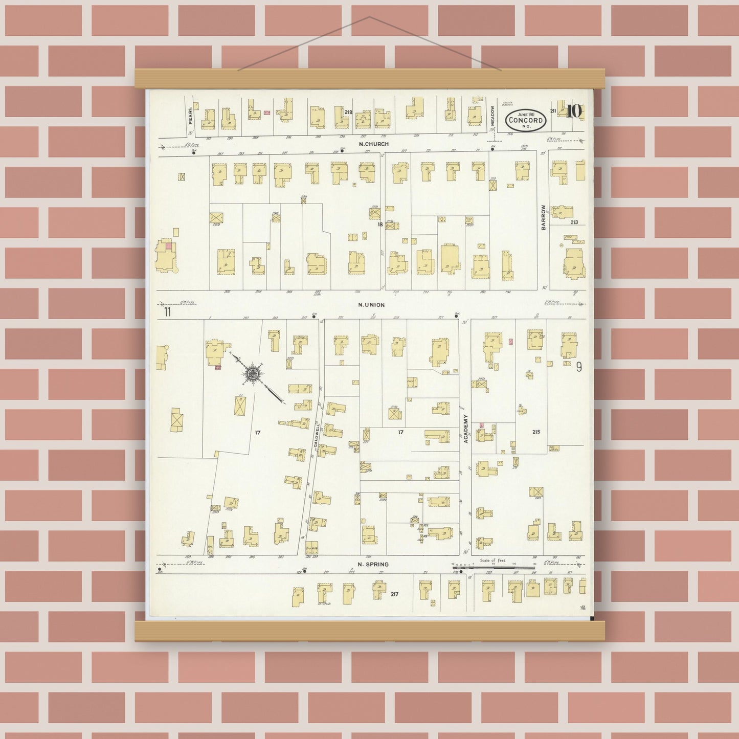 Old map wall art mockup — magnetic wood frame on brick wall — Sanborn Fire Insurance Map from Concord, Cabarrus County, North Carolina (1911), Sheet #0010