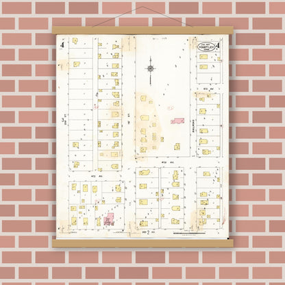 Old map wall art mockup — magnetic wood frame on brick wall — Sanborn Fire Insurance Map from Hartley, O'Brien County, Iowa (1936), Sheet #0004