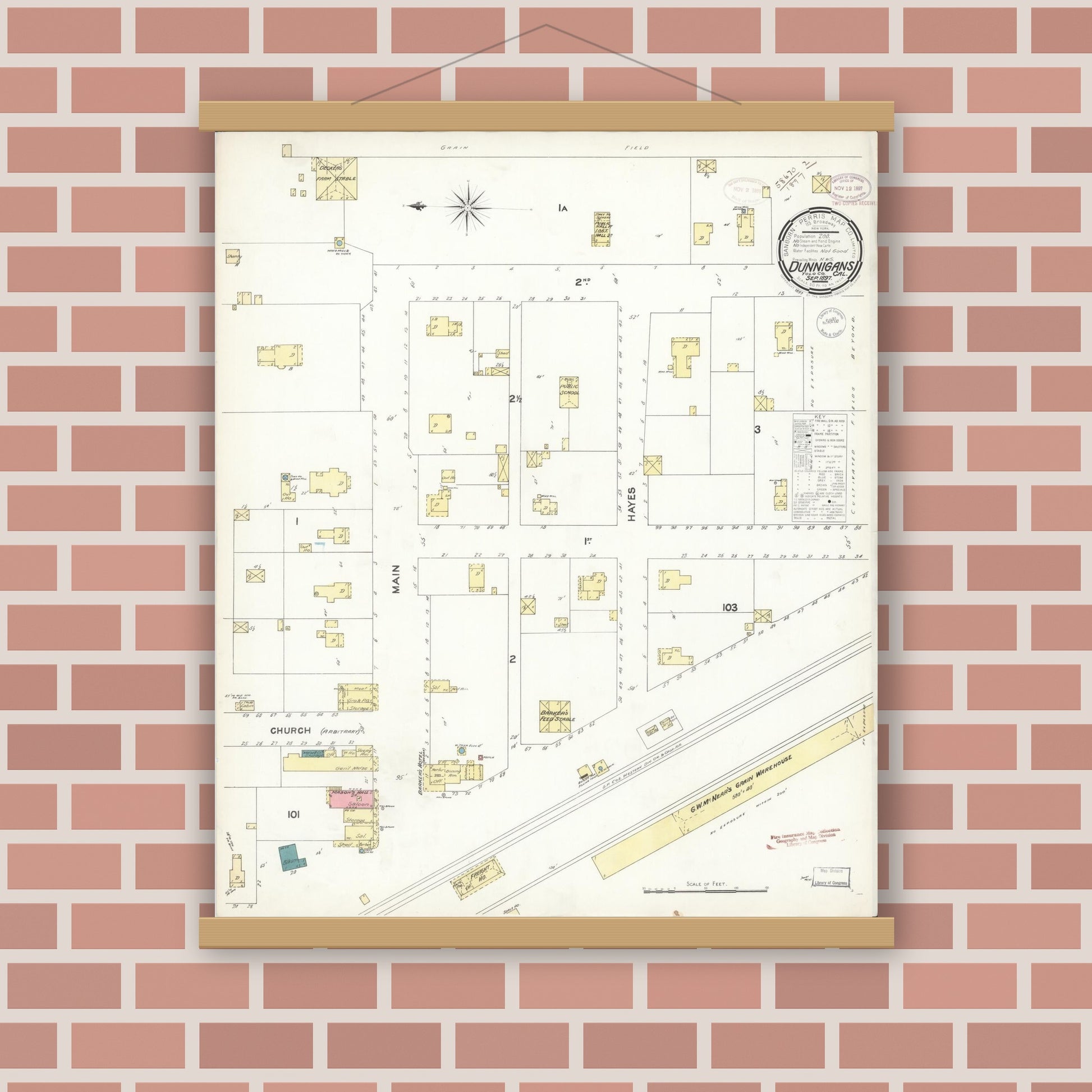 Old map wall art mockup — magnetic wood frame on brick wall — Sanborn Fire Insurance Map from Dunnigan, Yolo County, California (1897), Sheet #0001
