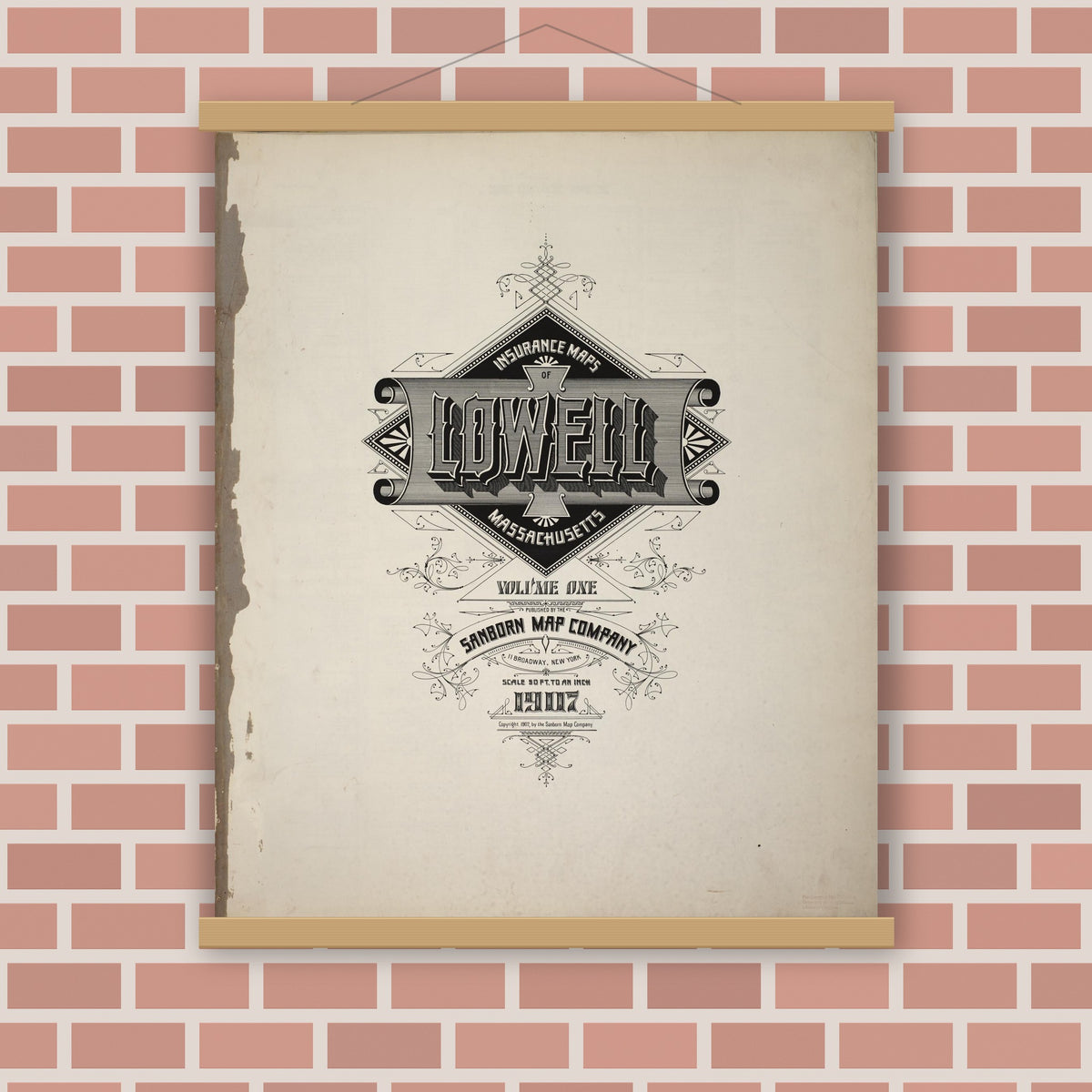 Old map wall art mockup — magnetic wood frame on brick wall — Sanborn Fire Insurance Map from Lowell, Middlesex County, Massachusetts (1907), Sheet #0001
