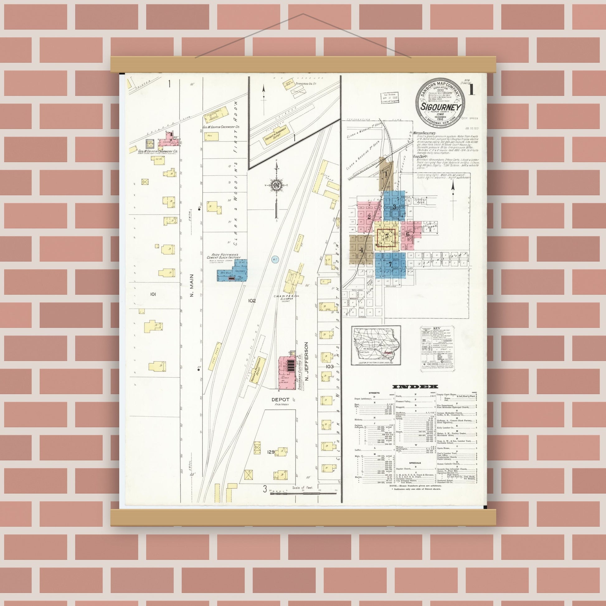 Old map wall art mockup — magnetic wood frame on brick wall — Sanborn Fire Insurance Map from Sigourney, Kiokuk County, Iowa (1916), Sheet #0001