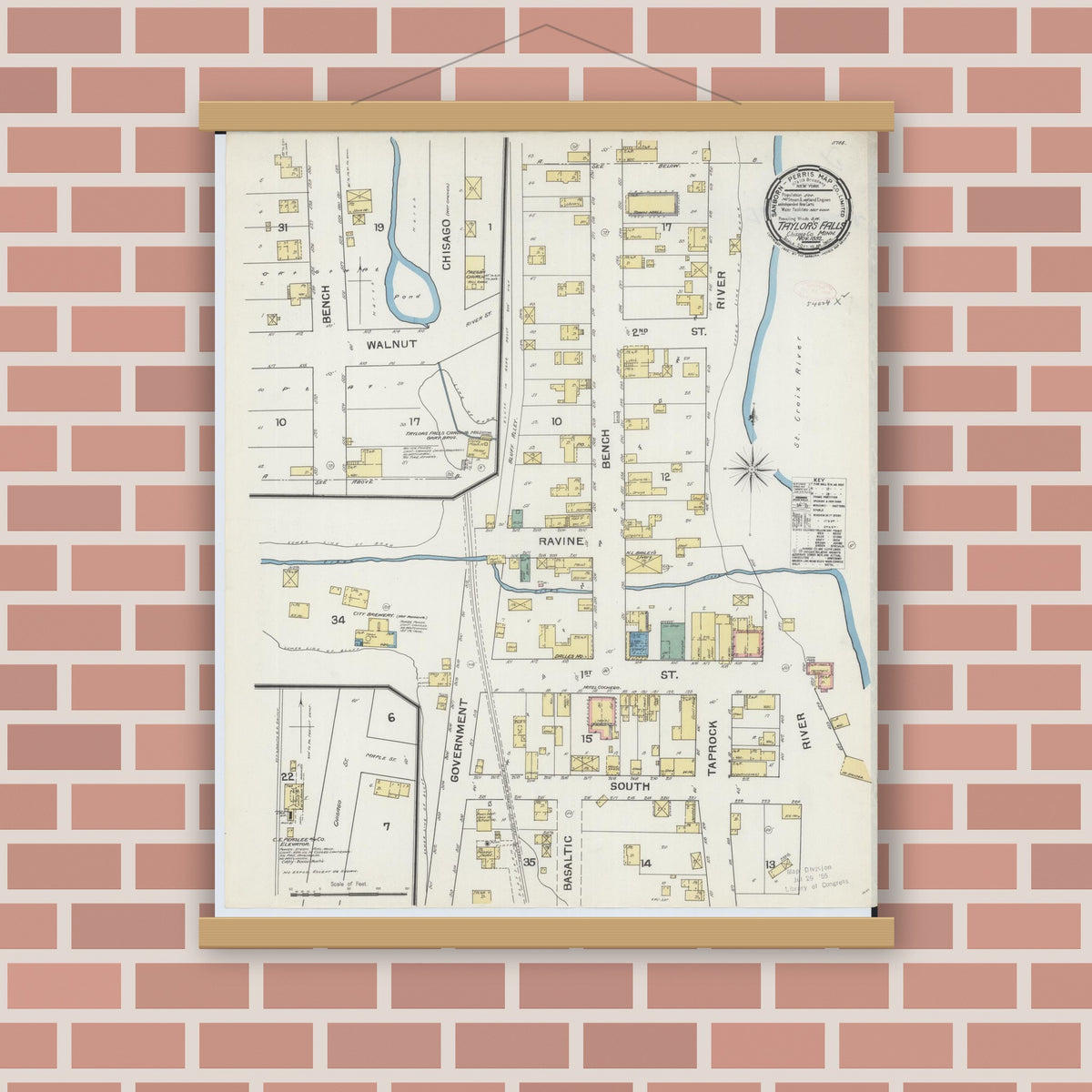 Old map wall art mockup — magnetic wood frame on brick wall — Sanborn Fire Insurance Map from Taylors Falls, Chisago County, Minnesota (1892), Sheet #0001