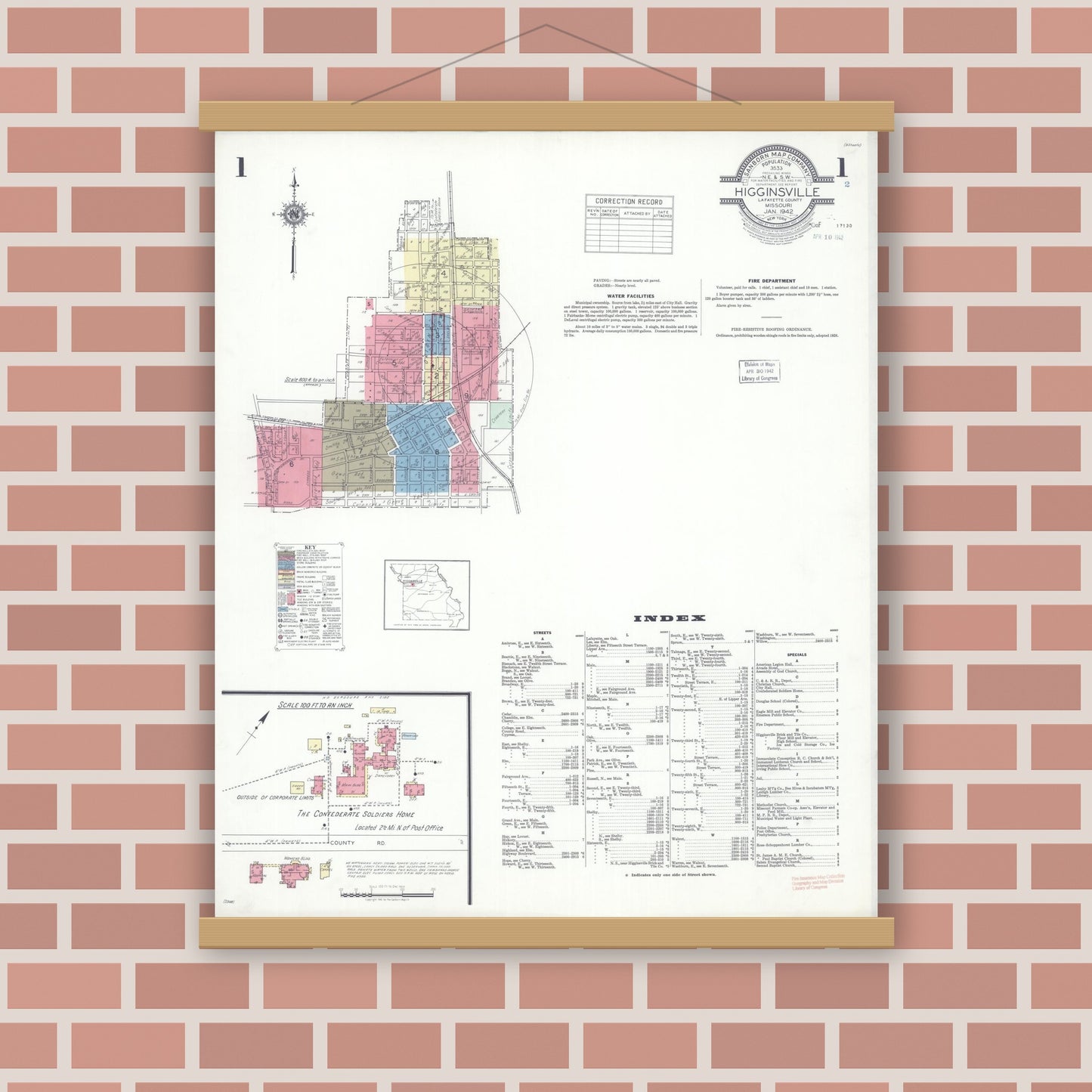 Old map wall art mockup — magnetic wood frame on brick wall — Sanborn Fire Insurance Map from Higginsville, Lafayette County, Missouri (1942) - Complete Map Set