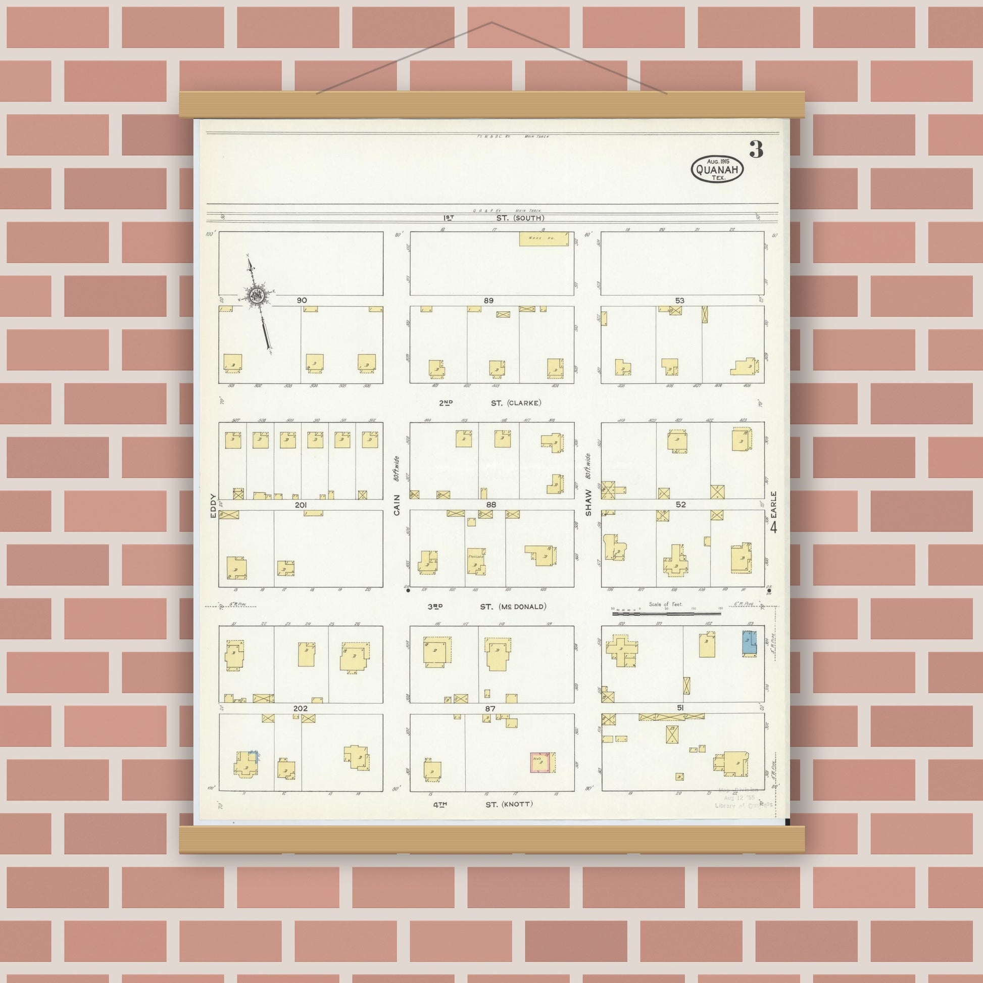 Old map wall art mockup — magnetic wood frame on brick wall — Sanborn Fire Insurance Map from Quanah, Hardeman County, Texas (1915), Sheet #0003