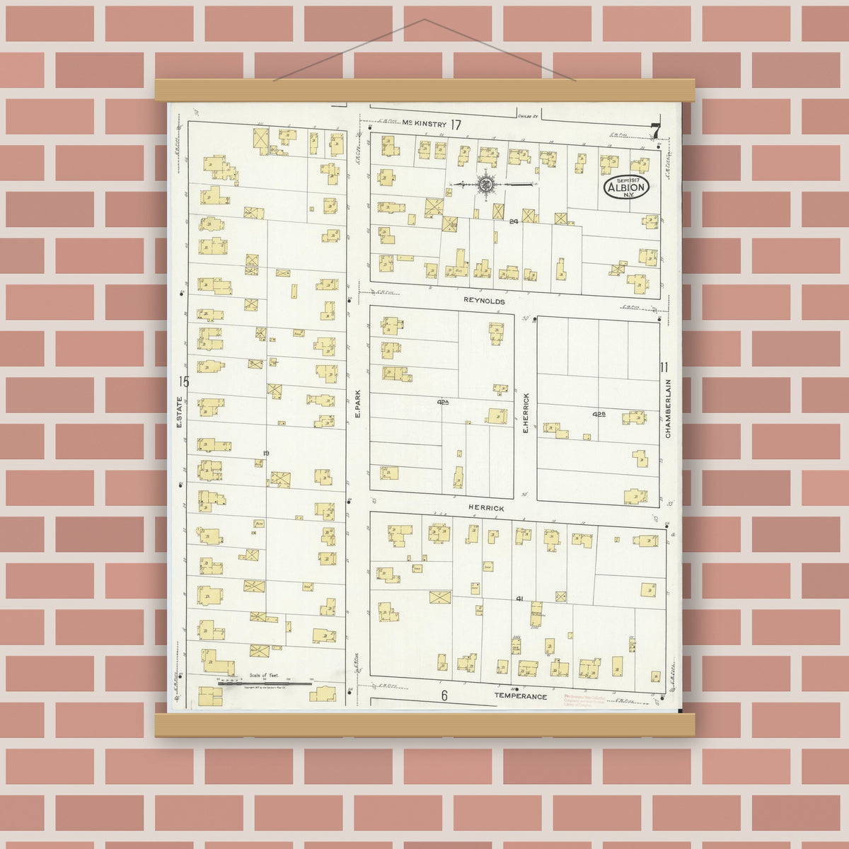 Old map wall art mockup — magnetic wood frame on brick wall — Sanborn Fire Insurance Map from Albion, Orleans County, New York (1917), Sheet #0007