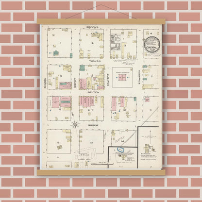 Old map wall art mockup — magnetic wood frame on brick wall — Sanborn Fire Insurance Map from Cameron, Milam County, Texas (1885), Sheet #0001