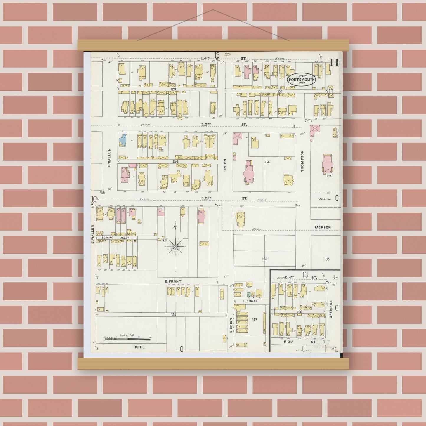 Old map wall art mockup — magnetic wood frame on brick wall — Sanborn Fire Insurance Map from Portsmouth, Scioto County, Ohio (1897), Sheet #0011