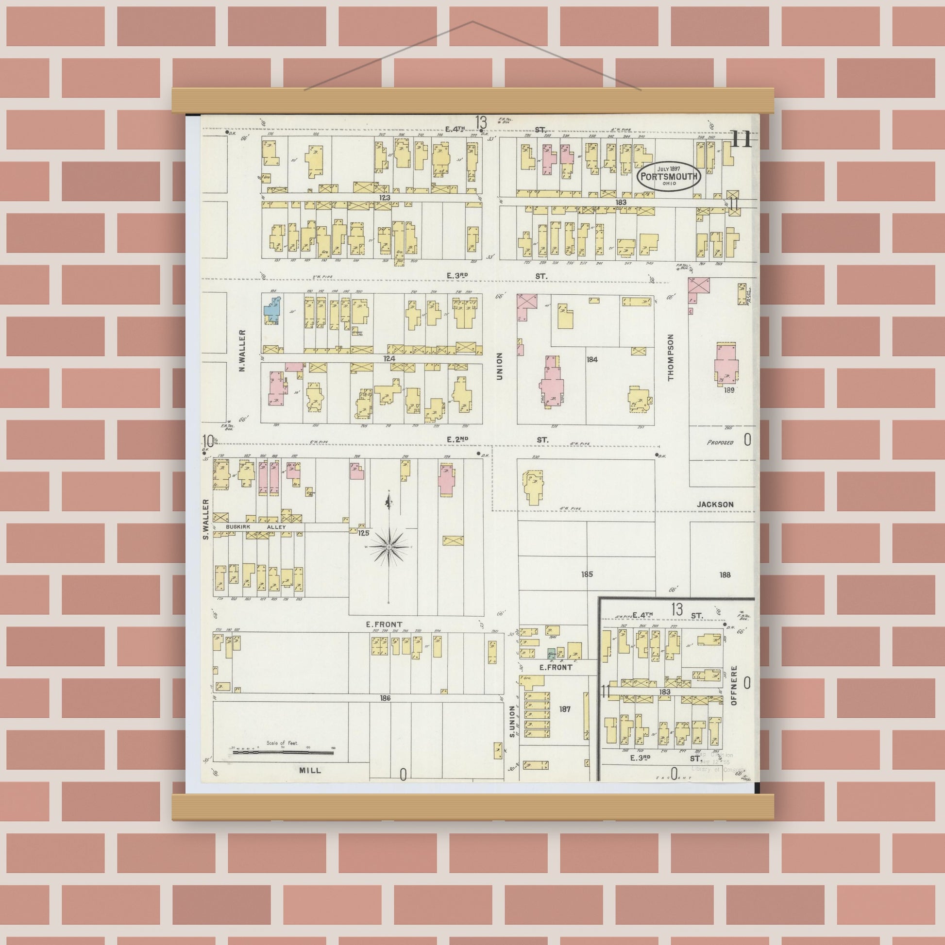 Old map wall art mockup — magnetic wood frame on brick wall — Sanborn Fire Insurance Map from Portsmouth, Scioto County, Ohio (1897), Sheet #0011