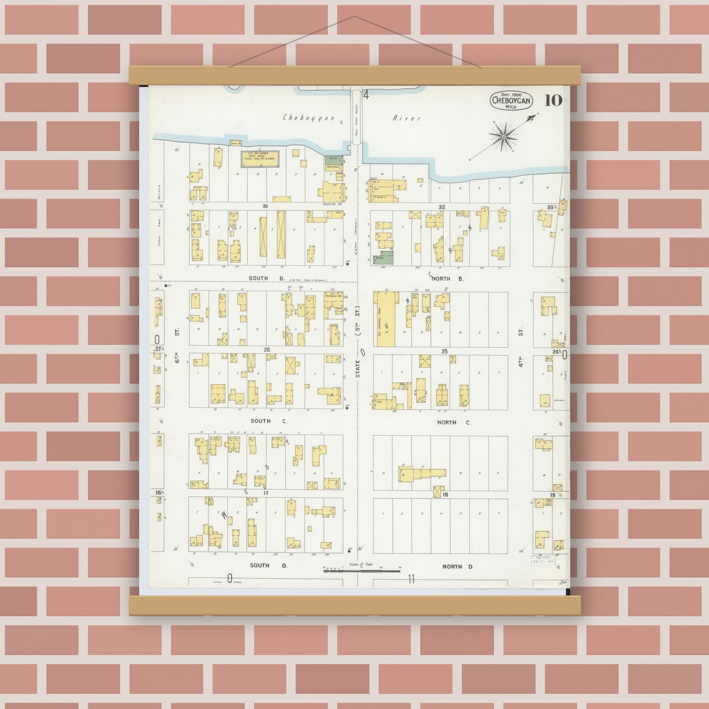 Old map wall art mockup — magnetic wood frame on brick wall — Sanborn Fire Insurance Map from Cheboygan, Cheboygan County, Michigan (1900), Sheet #0010