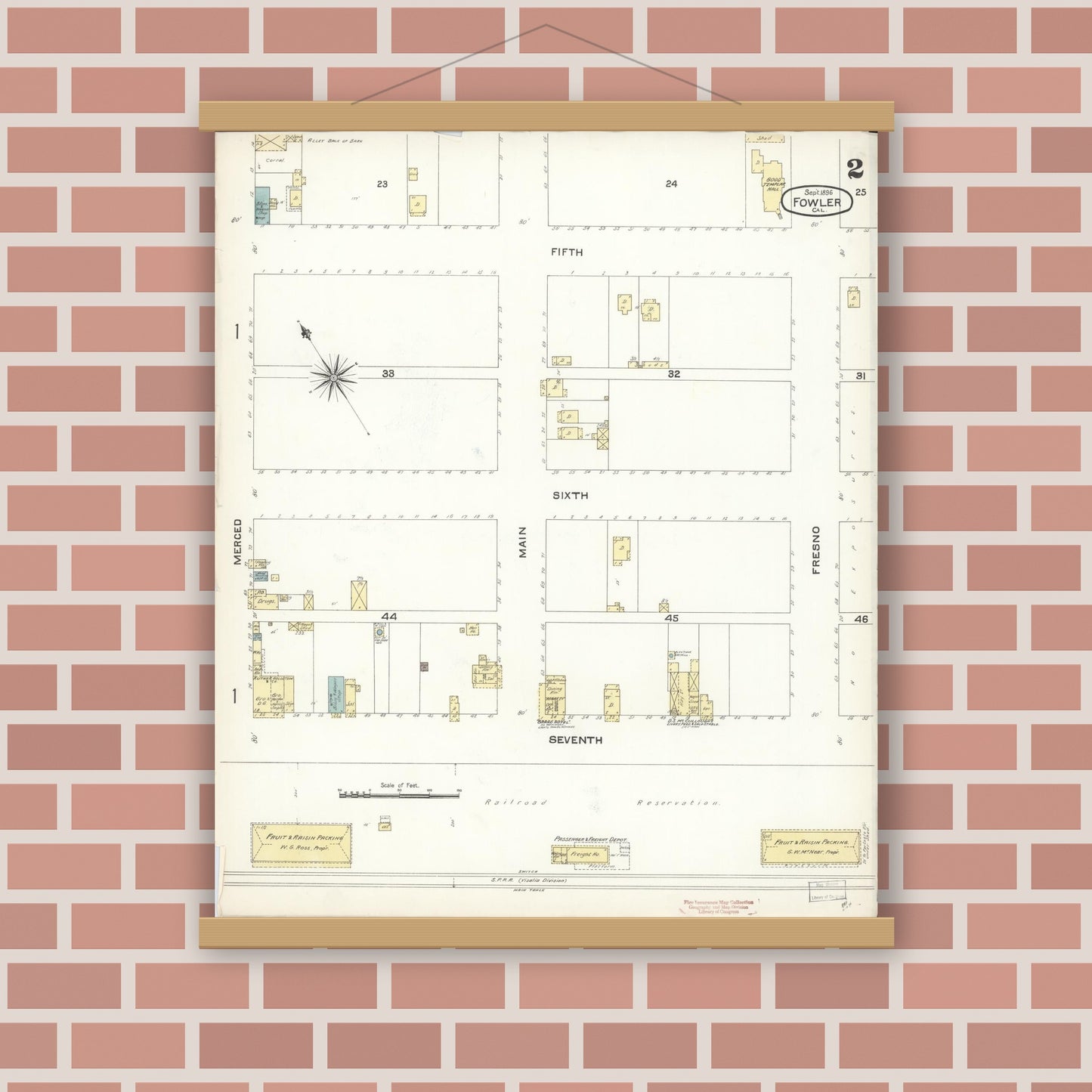 Old map wall art mockup — magnetic wood frame on brick wall — Sanborn Fire Insurance Map from Fowler, Fresno County, California (1896), Sheet #0002