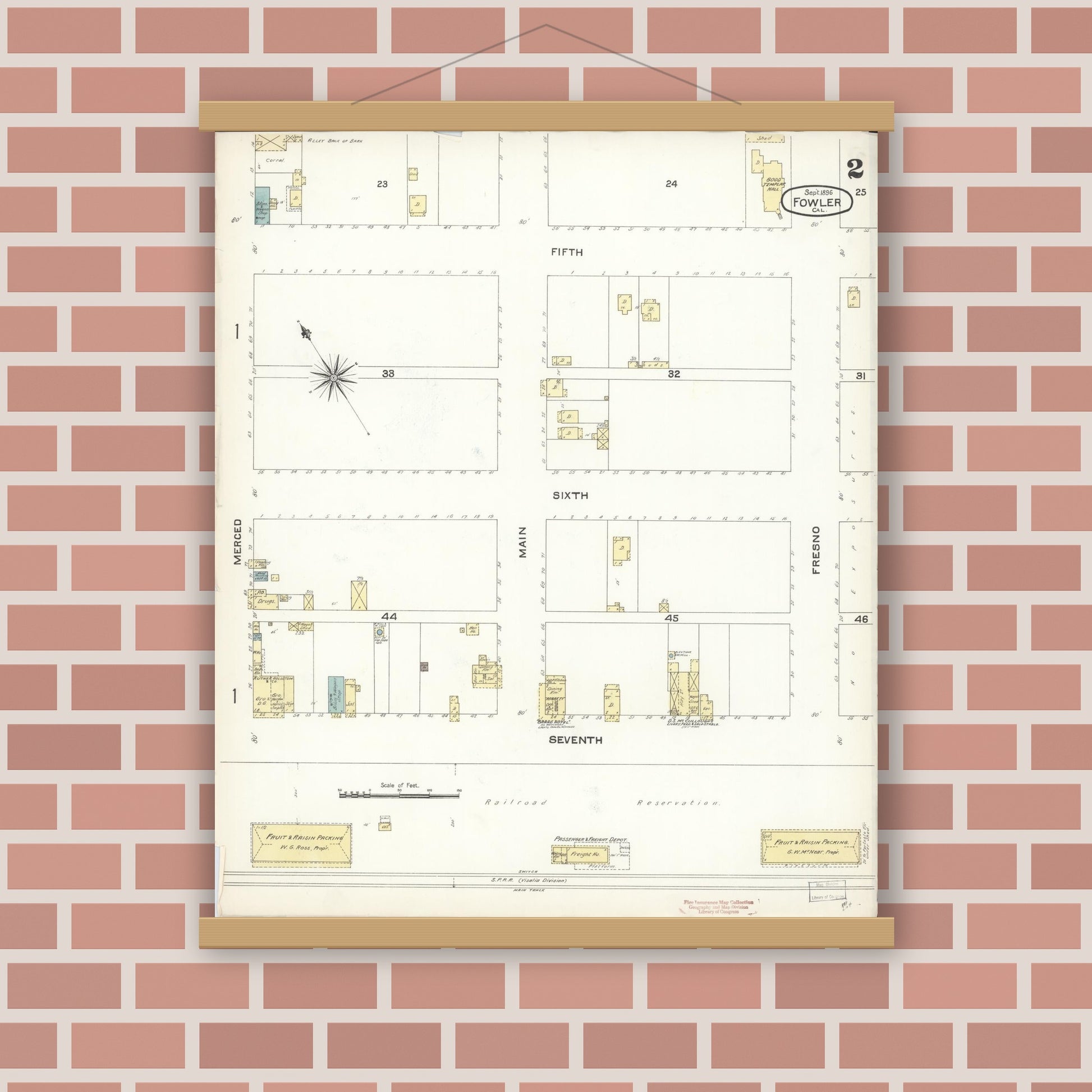 Old map wall art mockup — magnetic wood frame on brick wall — Sanborn Fire Insurance Map from Fowler, Fresno County, California (1896), Sheet #0002