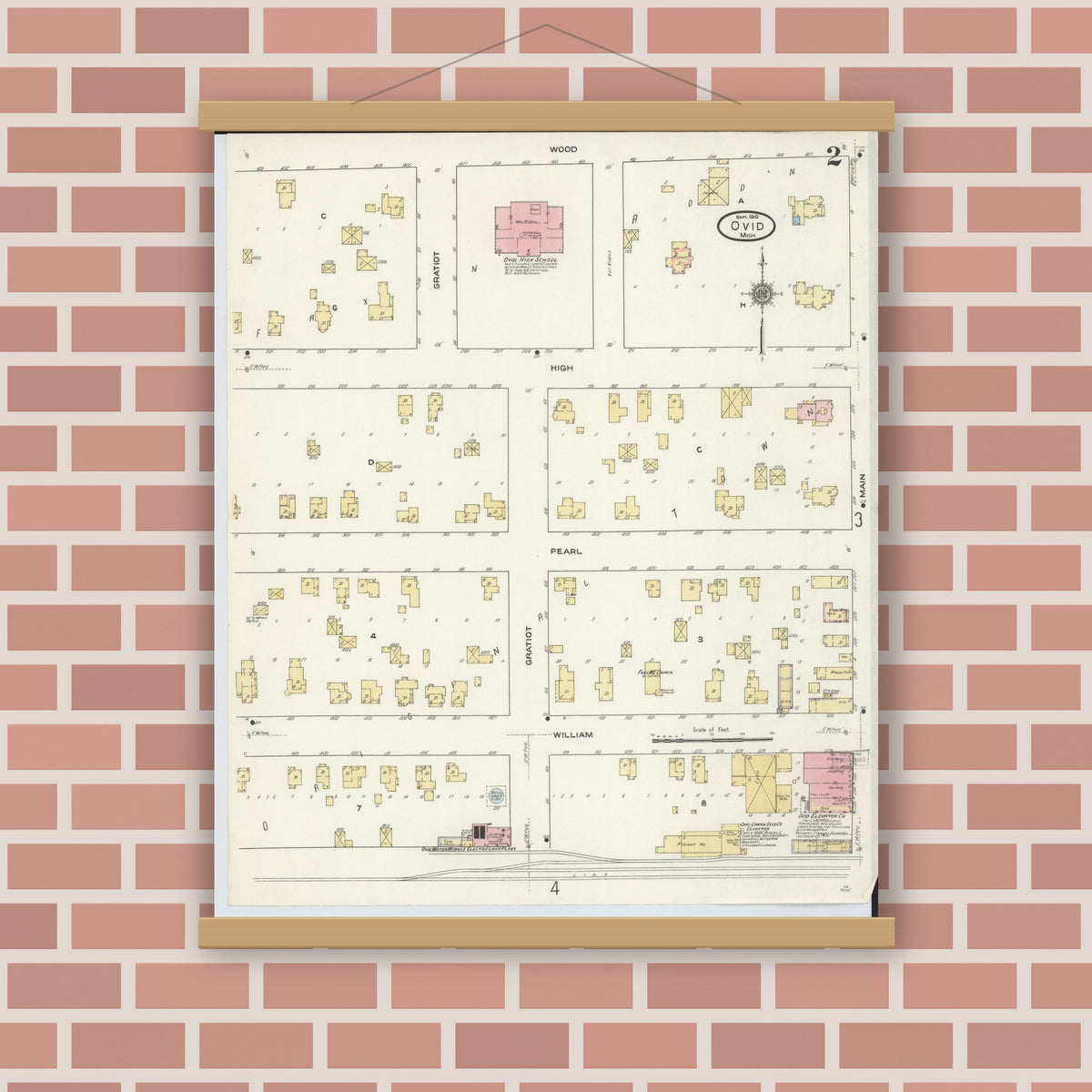 Old map wall art mockup — magnetic wood frame on brick wall — Sanborn Fire Insurance Map from Ovid, Clinton County, Michigan (1910), Sheet #0002