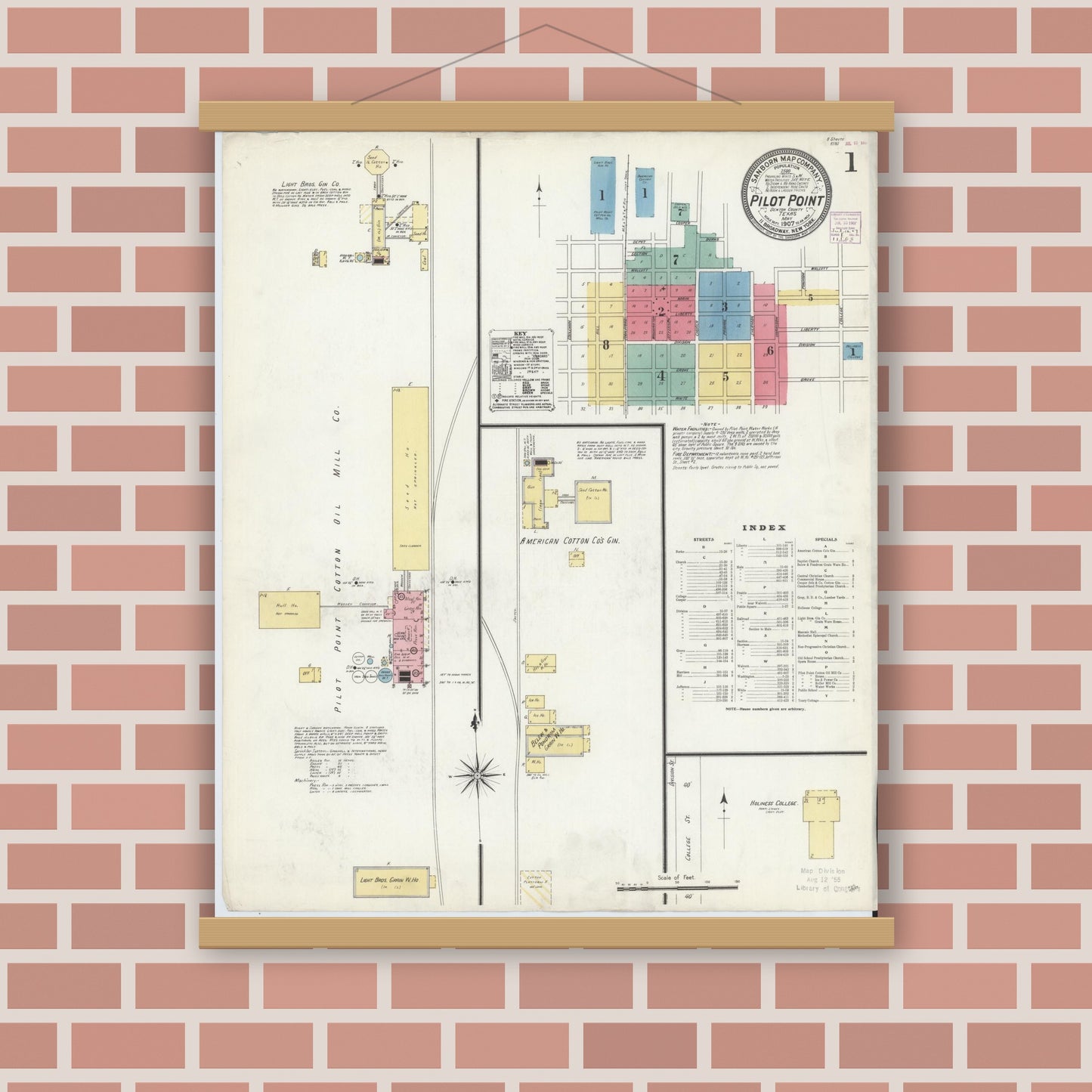 Old map wall art mockup — magnetic wood frame on brick wall — Sanborn Fire Insurance Map from Pilot Point, Denton County, Texas (1907), Sheet #0001