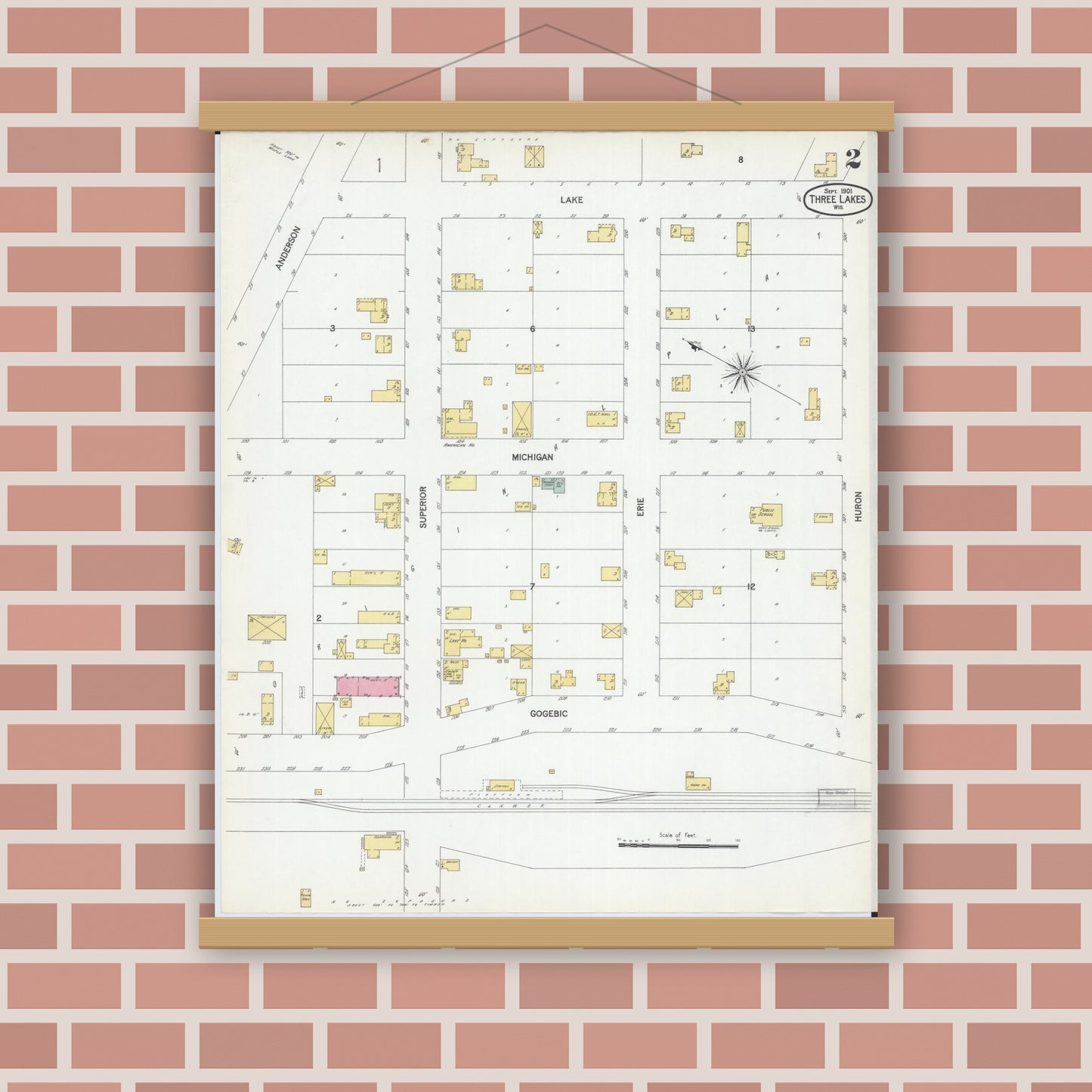 Old map wall art mockup — magnetic wood frame on brick wall — Sanborn Fire Insurance Map from Three Lakes, Oneida County, Wisconsin (1901), Sheet #0002
