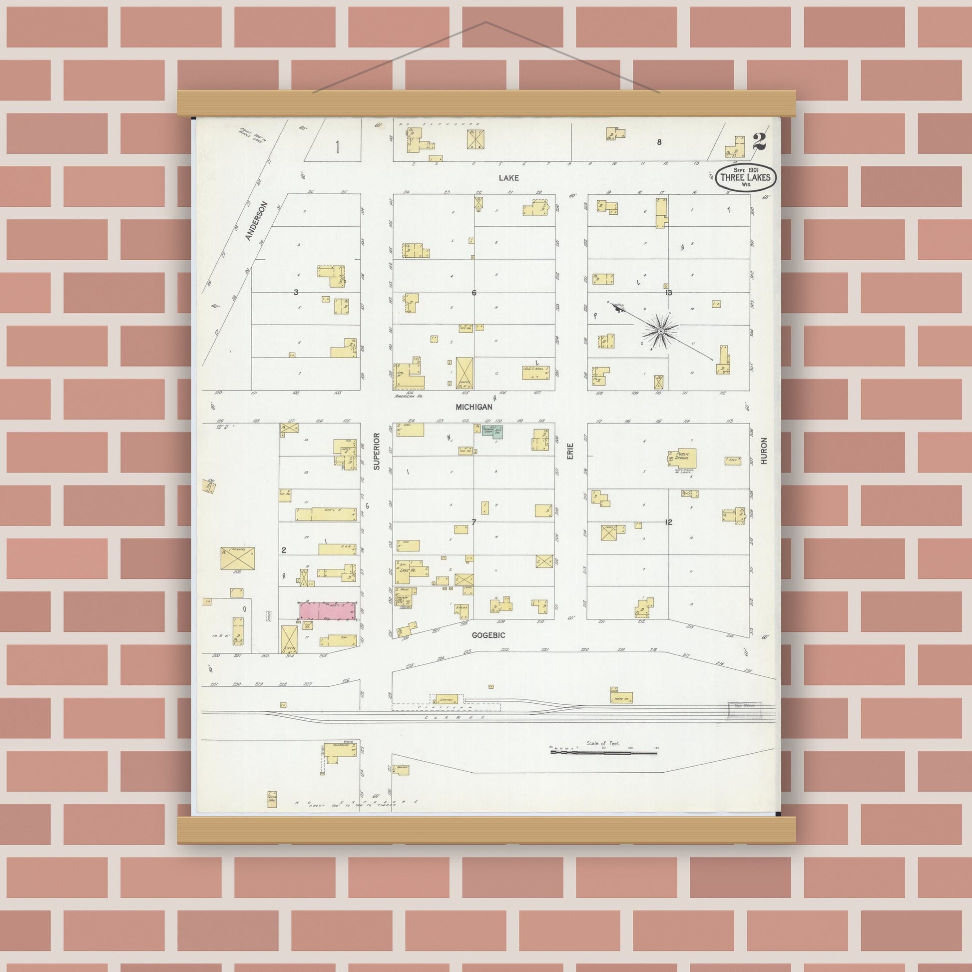 Old map wall art mockup — magnetic wood frame on brick wall — Sanborn Fire Insurance Map from Three Lakes, Oneida County, Wisconsin (1901), Sheet #0002