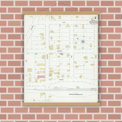 Old map wall art mockup — magnetic wood frame on brick wall — Sanborn Fire Insurance Map from Three Lakes, Oneida County, Wisconsin (1901), Sheet #0002