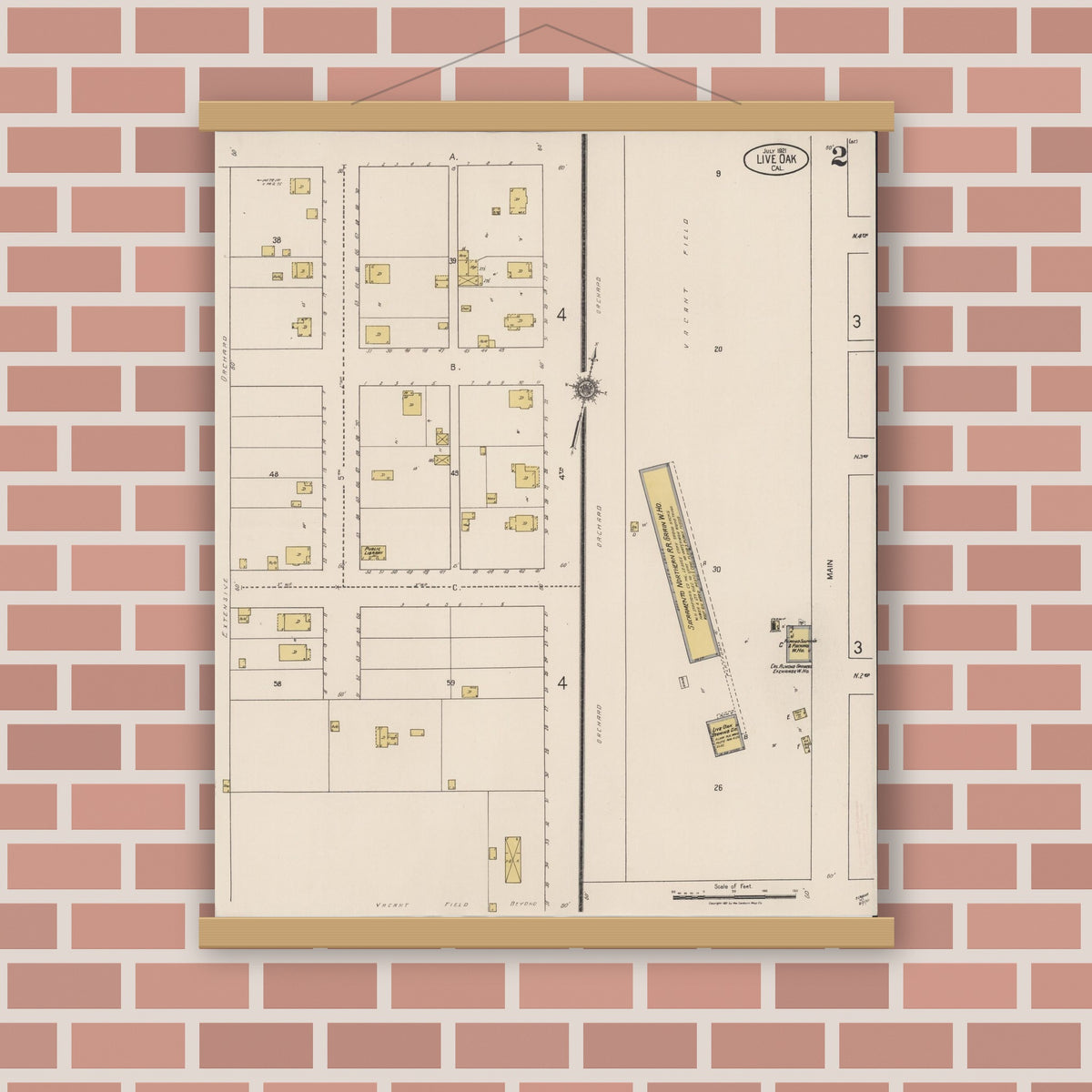Old map wall art mockup — magnetic wood frame on brick wall — Sanborn Fire Insurance Map from Live Oak, Sutter County, California (1921), Sheet #0002