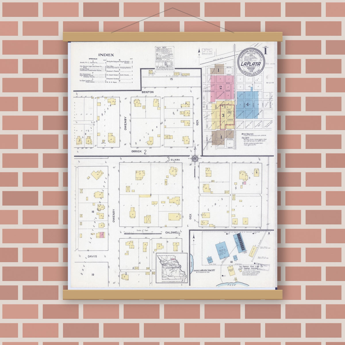 Old map wall art mockup — magnetic wood frame on brick wall — Sanborn Fire Insurance Map from La Plata, Macon County, Missouri (1916) - Complete Map Set