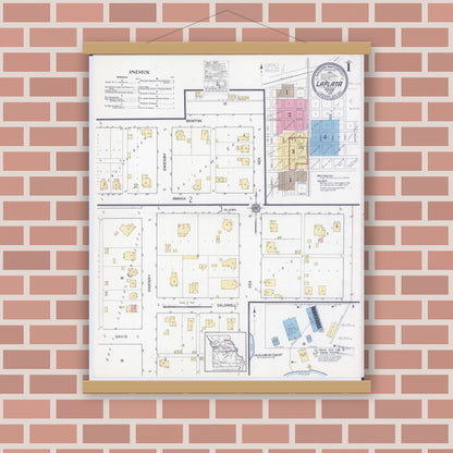 Old map wall art mockup — magnetic wood frame on brick wall — Sanborn Fire Insurance Map from La Plata, Macon County, Missouri (1916) - Complete Map Set