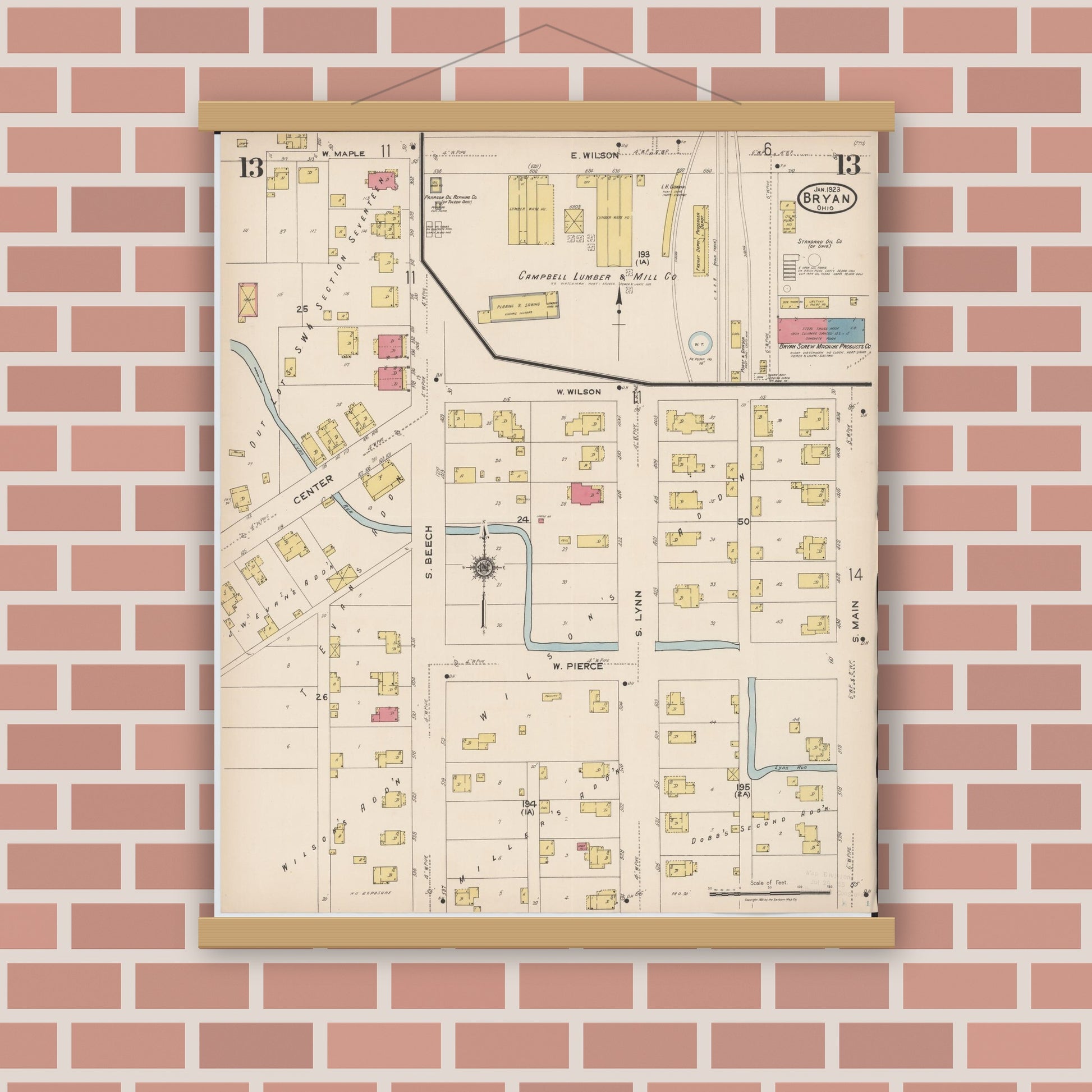 Old map wall art mockup — magnetic wood frame on brick wall — Sanborn Fire Insurance Map from Bryan, Williams County, Ohio (1923), Sheet #0013