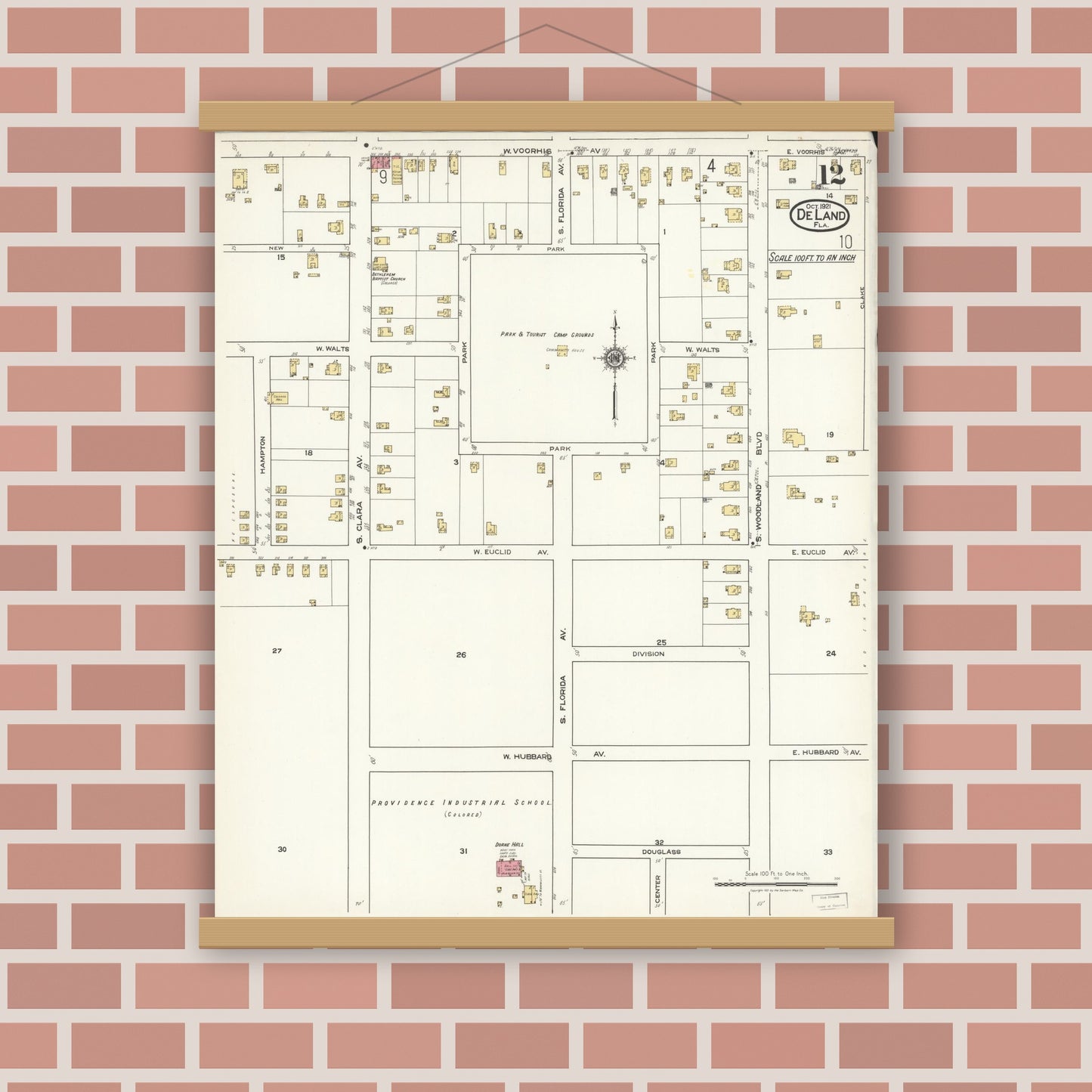 Old map wall art mockup — magnetic wood frame on brick wall — Sanborn Fire Insurance Map from De Land, Volusia County, Florida (1921), Sheet #0012