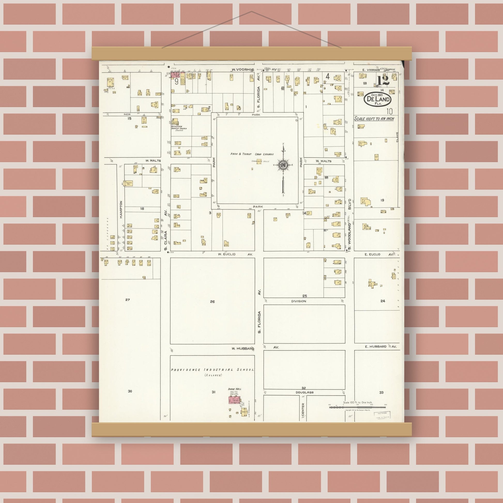 Old map wall art mockup — magnetic wood frame on brick wall — Sanborn Fire Insurance Map from De Land, Volusia County, Florida (1921), Sheet #0012