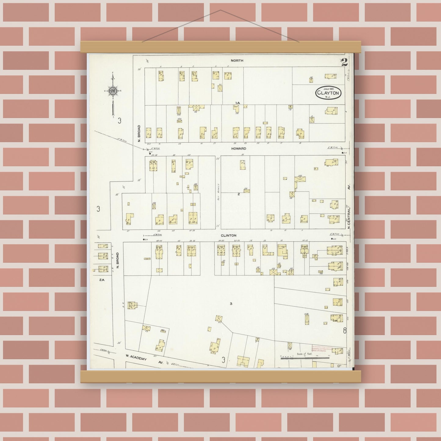 Old map wall art mockup — magnetic wood frame on brick wall — Sanborn Fire Insurance Map from Clayton, Gloucester County, New Jersey (1910), Sheet #0002