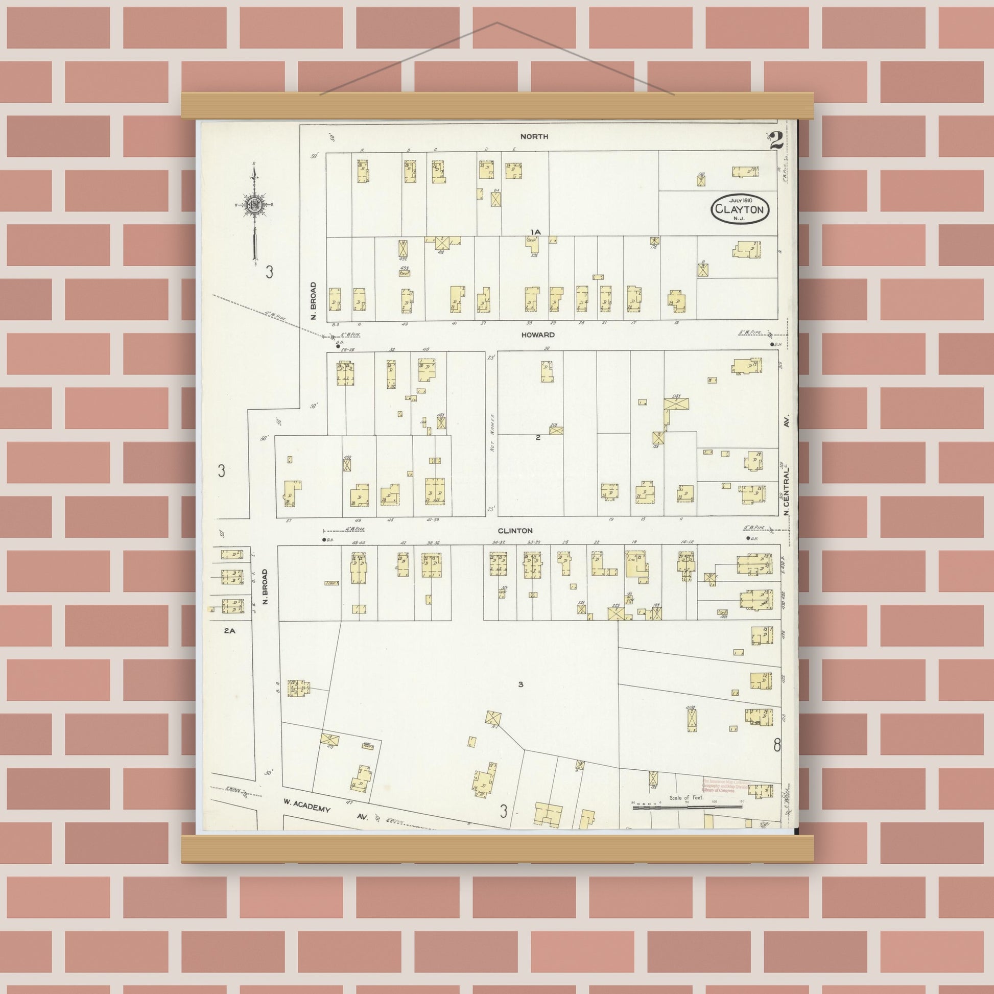 Old map wall art mockup — magnetic wood frame on brick wall — Sanborn Fire Insurance Map from Clayton, Gloucester County, New Jersey (1910), Sheet #0002