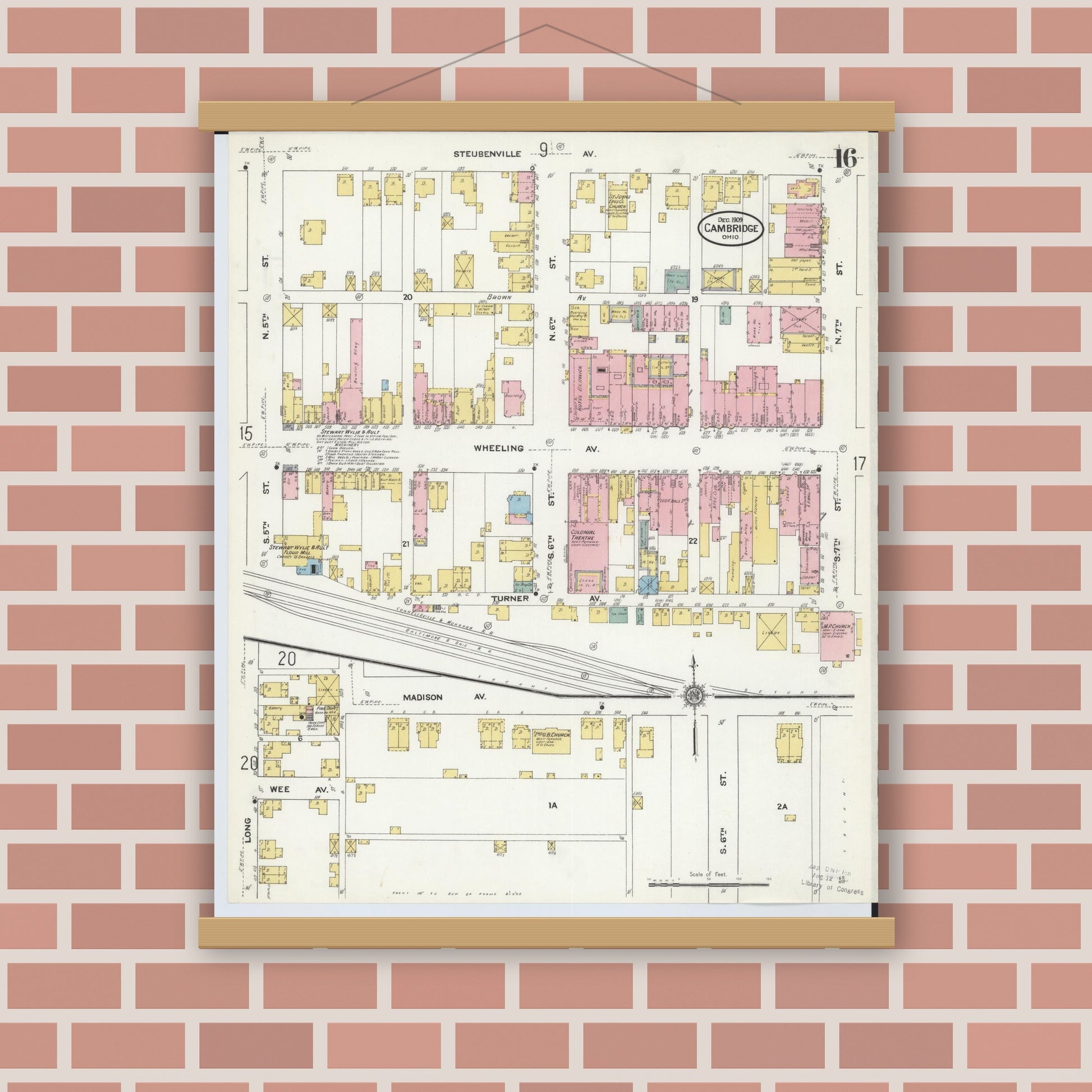 Old map wall art mockup — magnetic wood frame on brick wall — Sanborn Fire Insurance Map from Cambridge, Guernsey County, Ohio (1909), Sheet #0016