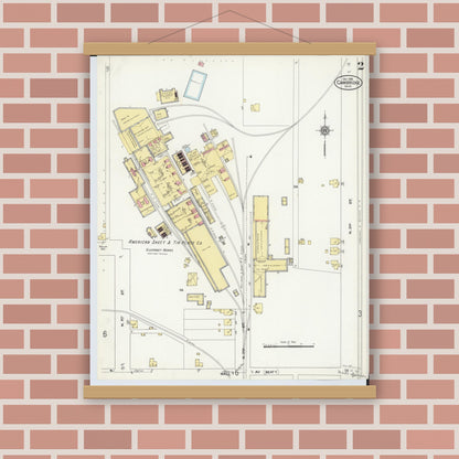 Old map wall art mockup — magnetic wood frame on brick wall — Sanborn Fire Insurance Map from Cambridge, Guernsey County, Ohio (1909), Sheet #0002