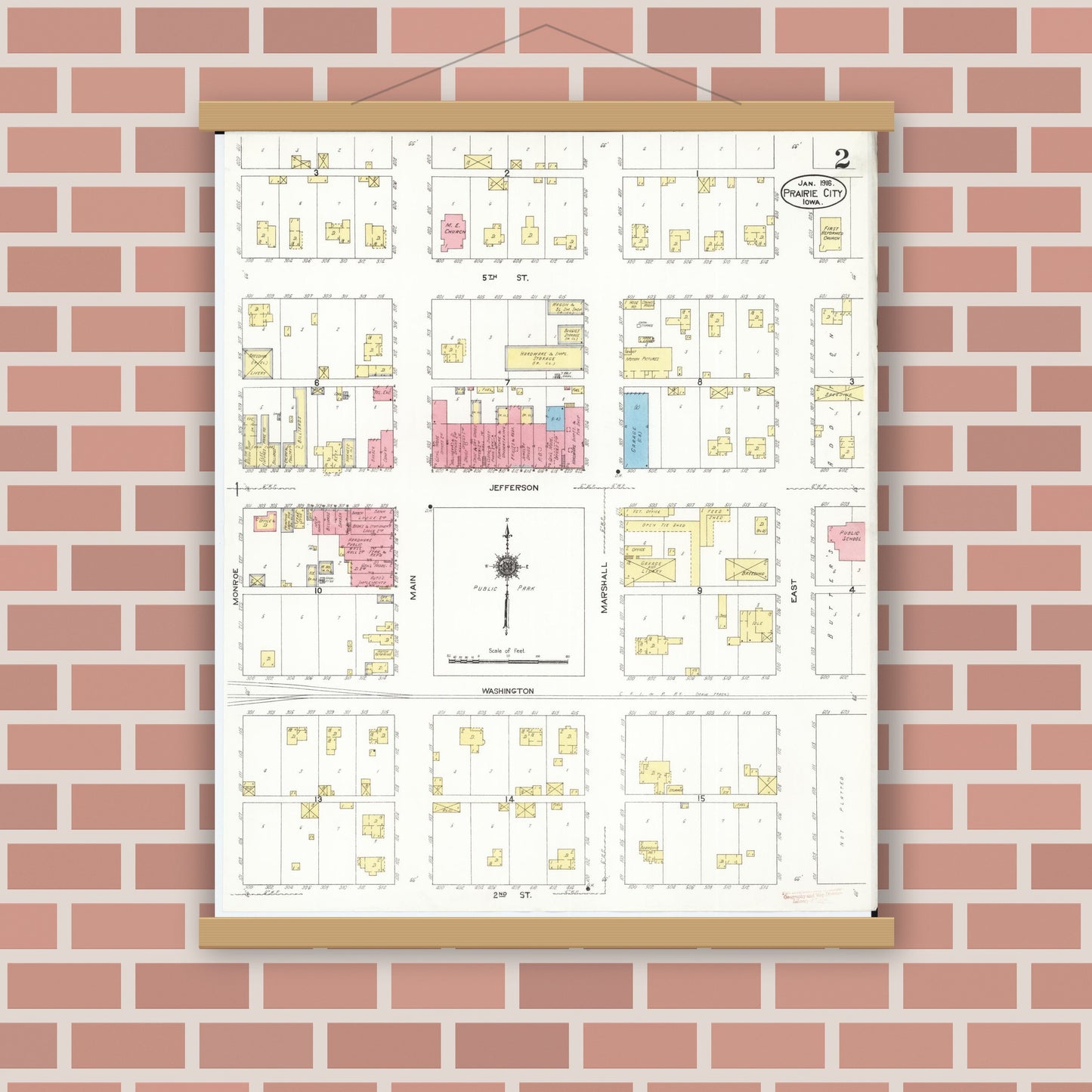 Old map wall art mockup — magnetic wood frame on brick wall — Sanborn Fire Insurance Map from Prairie City, Jasper County, Iowa (1916), Sheet #0002